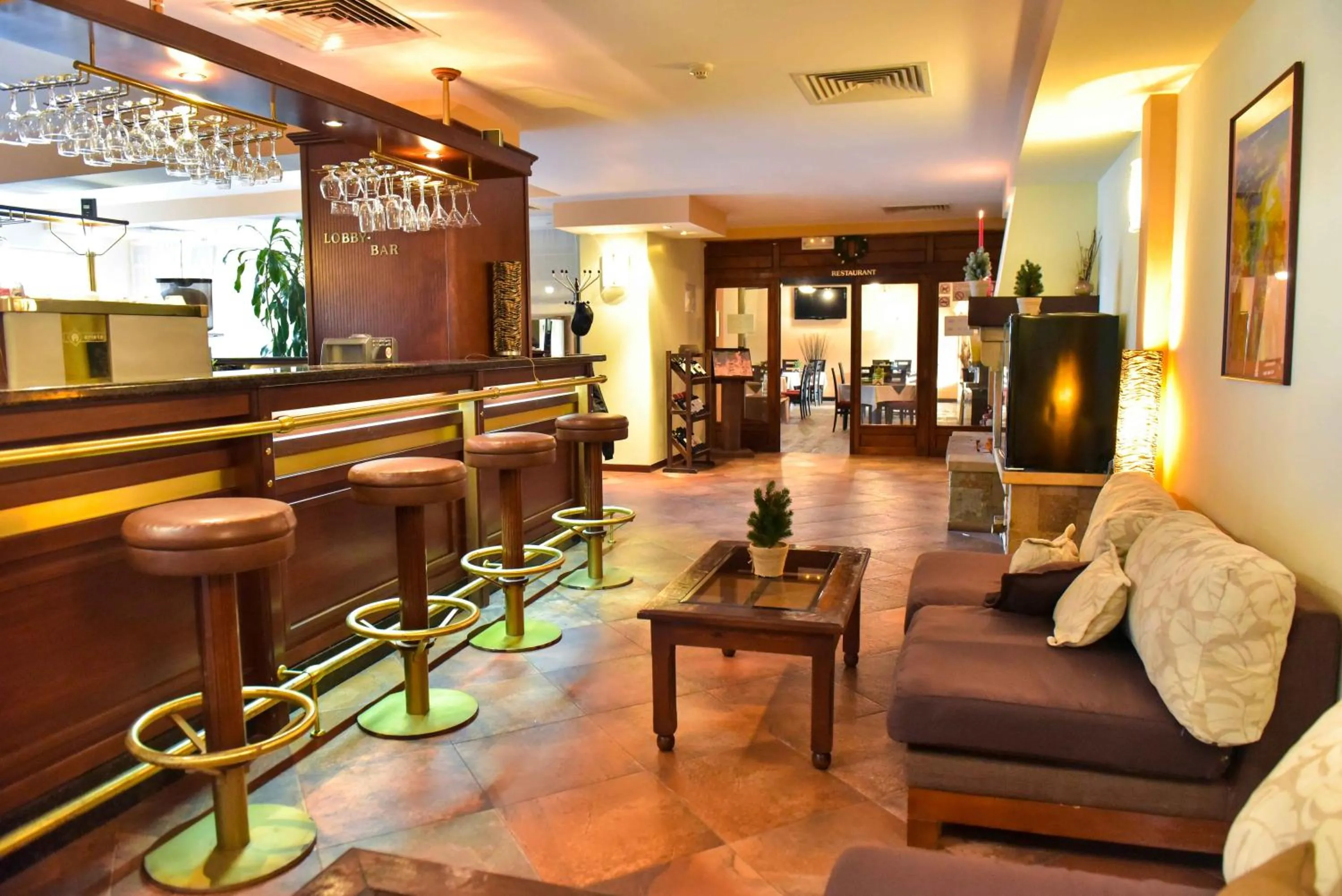 Lobby or reception in Hotel Bojur & Bojurland Apartment Complex