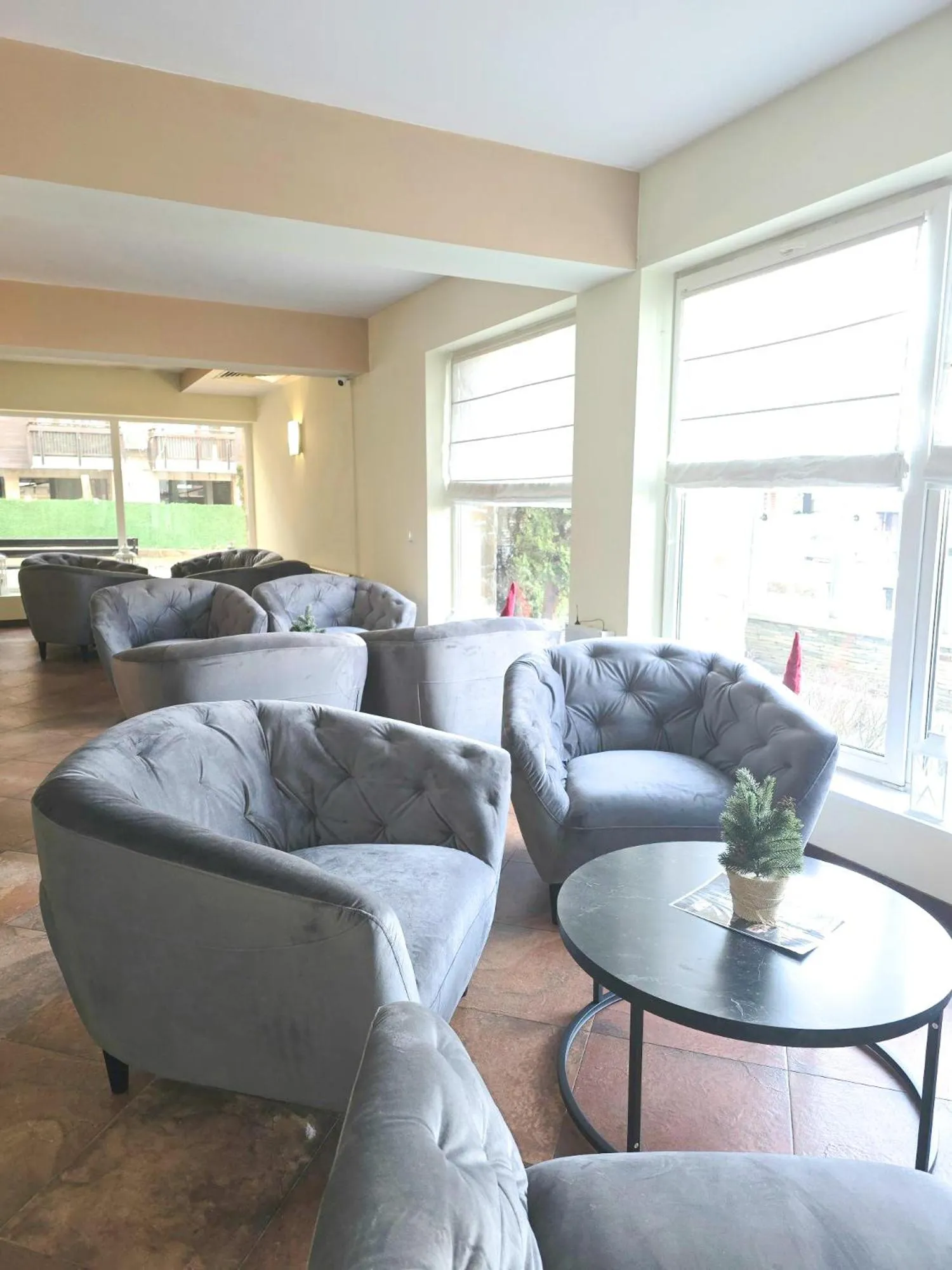 Lobby or reception in Hotel Bojur & Bojurland Apartment Complex