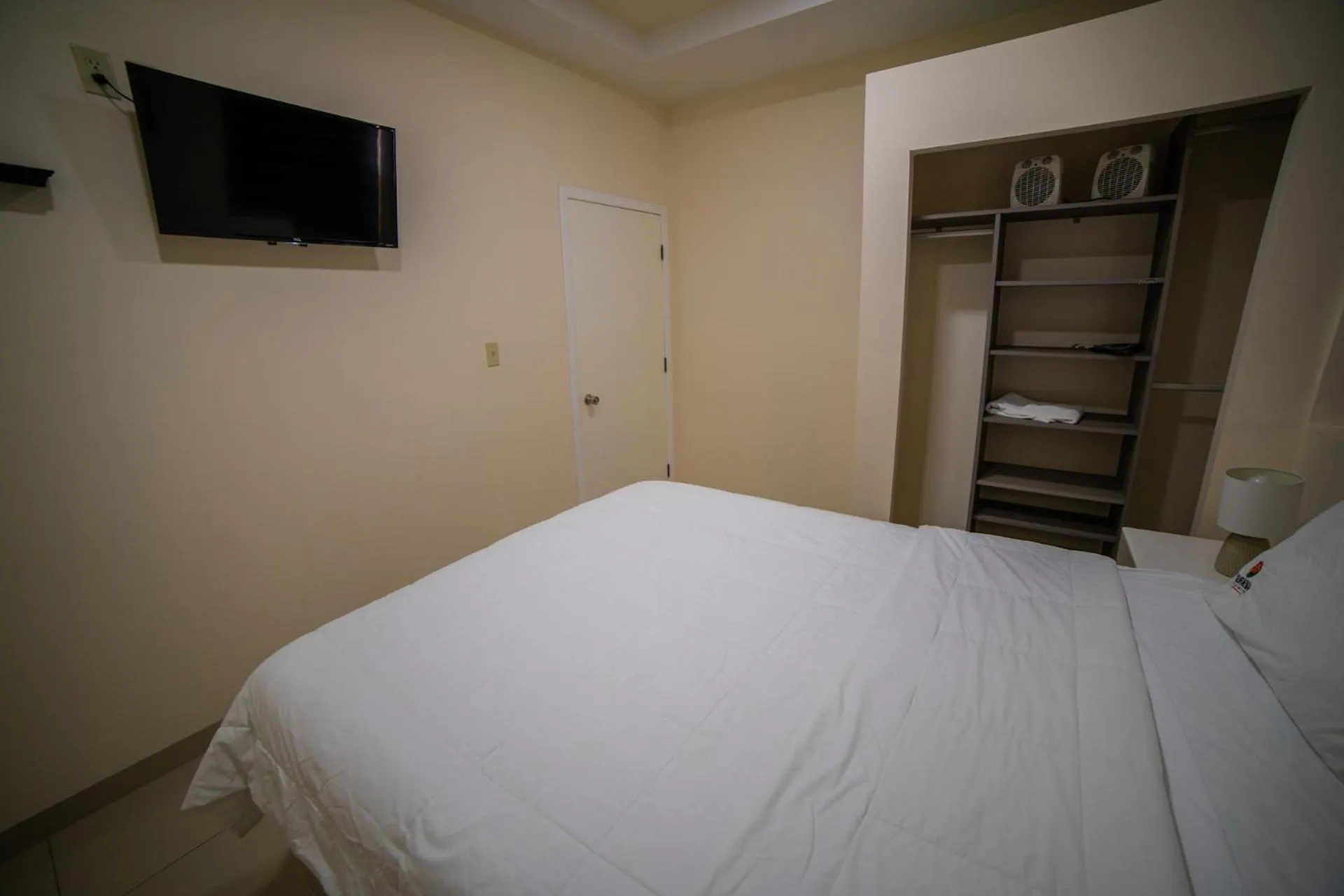 Bed in California Comfort & Suites