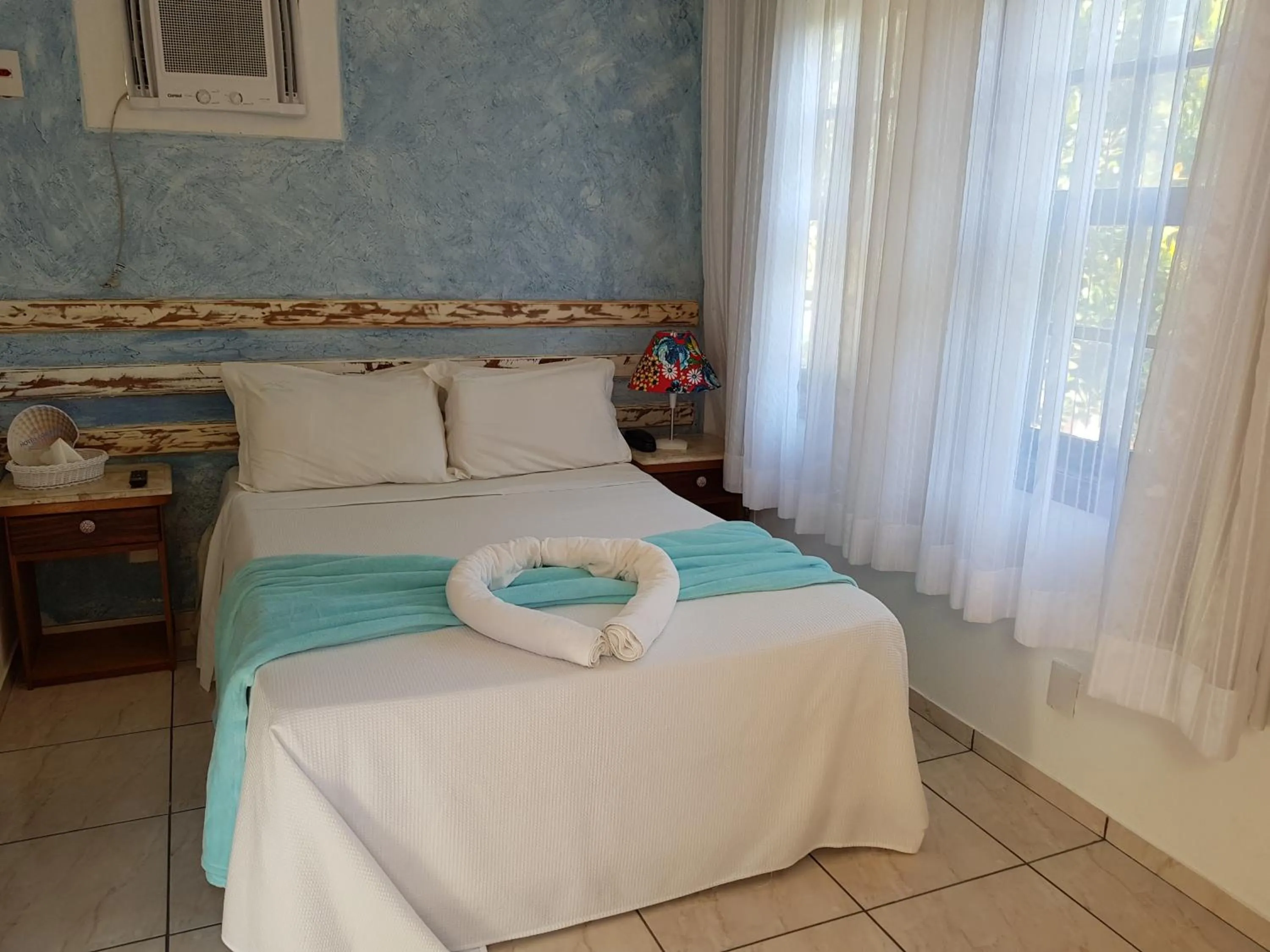 Bed in Coronado Inn Hotel