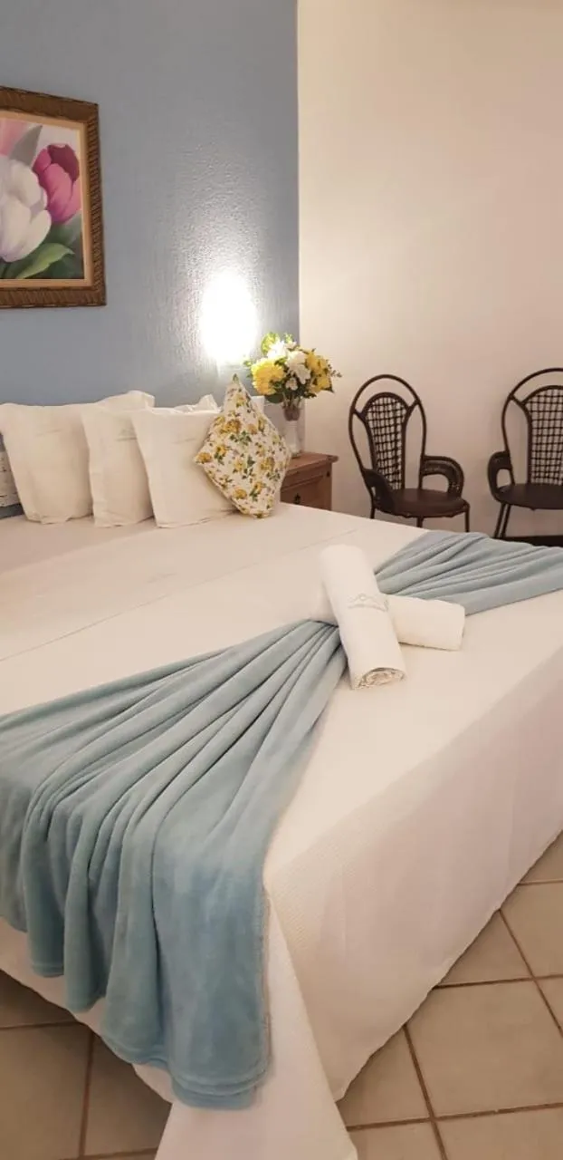 Bed in Coronado Inn Hotel