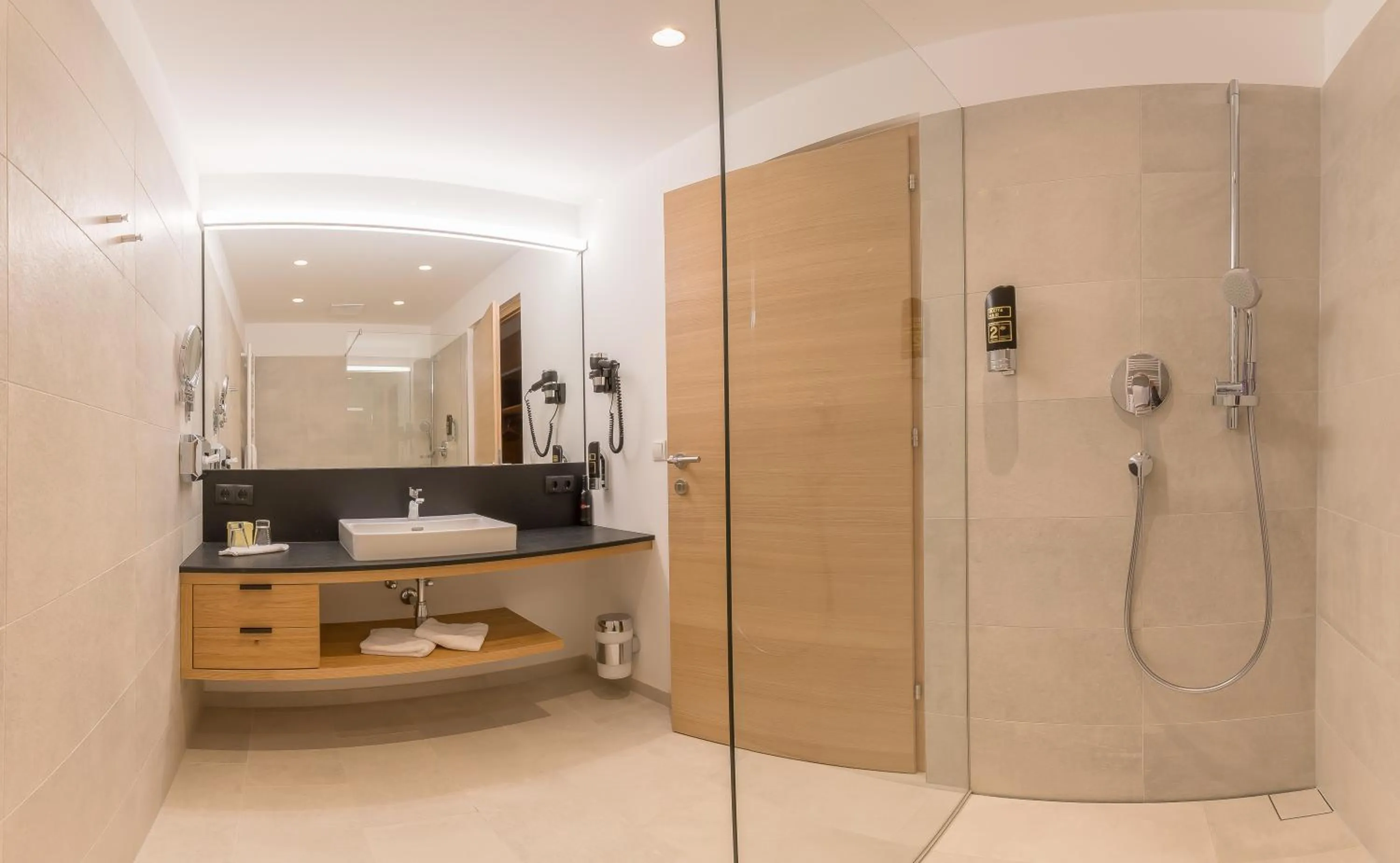 Shower in KOSIS Sports Lifestyle Hotel