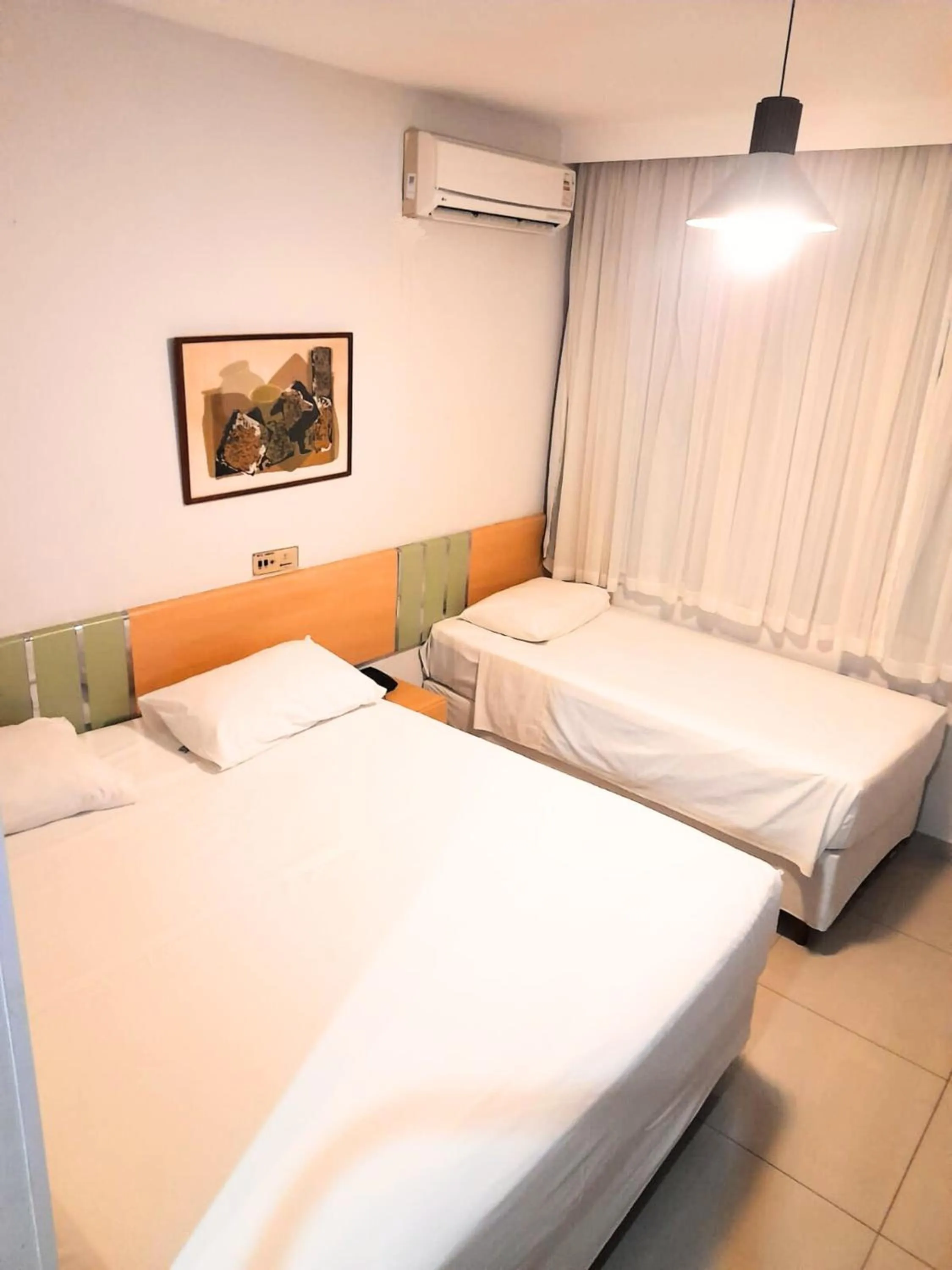 Bed in Sumatra Hotel e Centro de Convenções