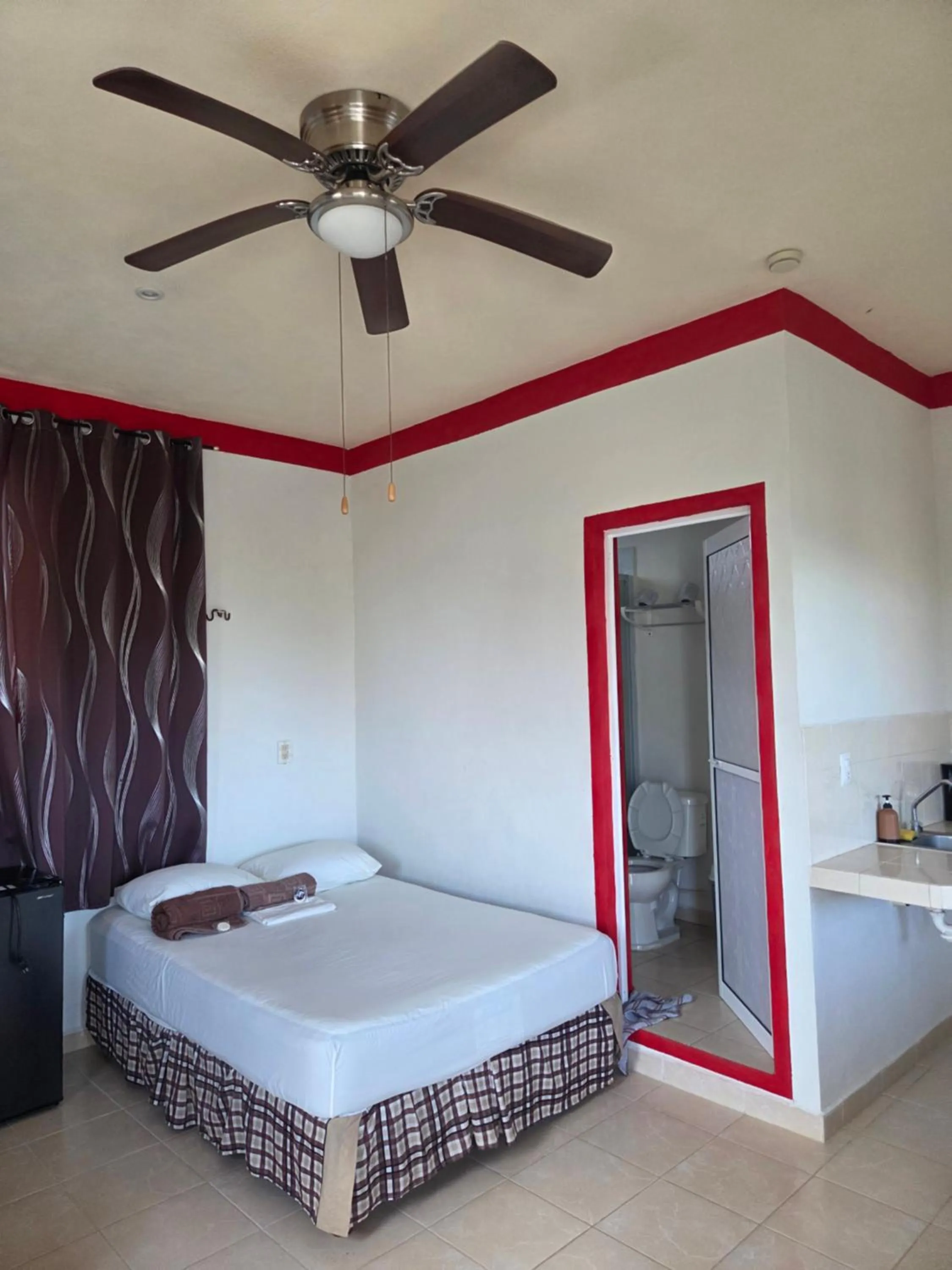 Photo of the whole room, Bed in El Padrino