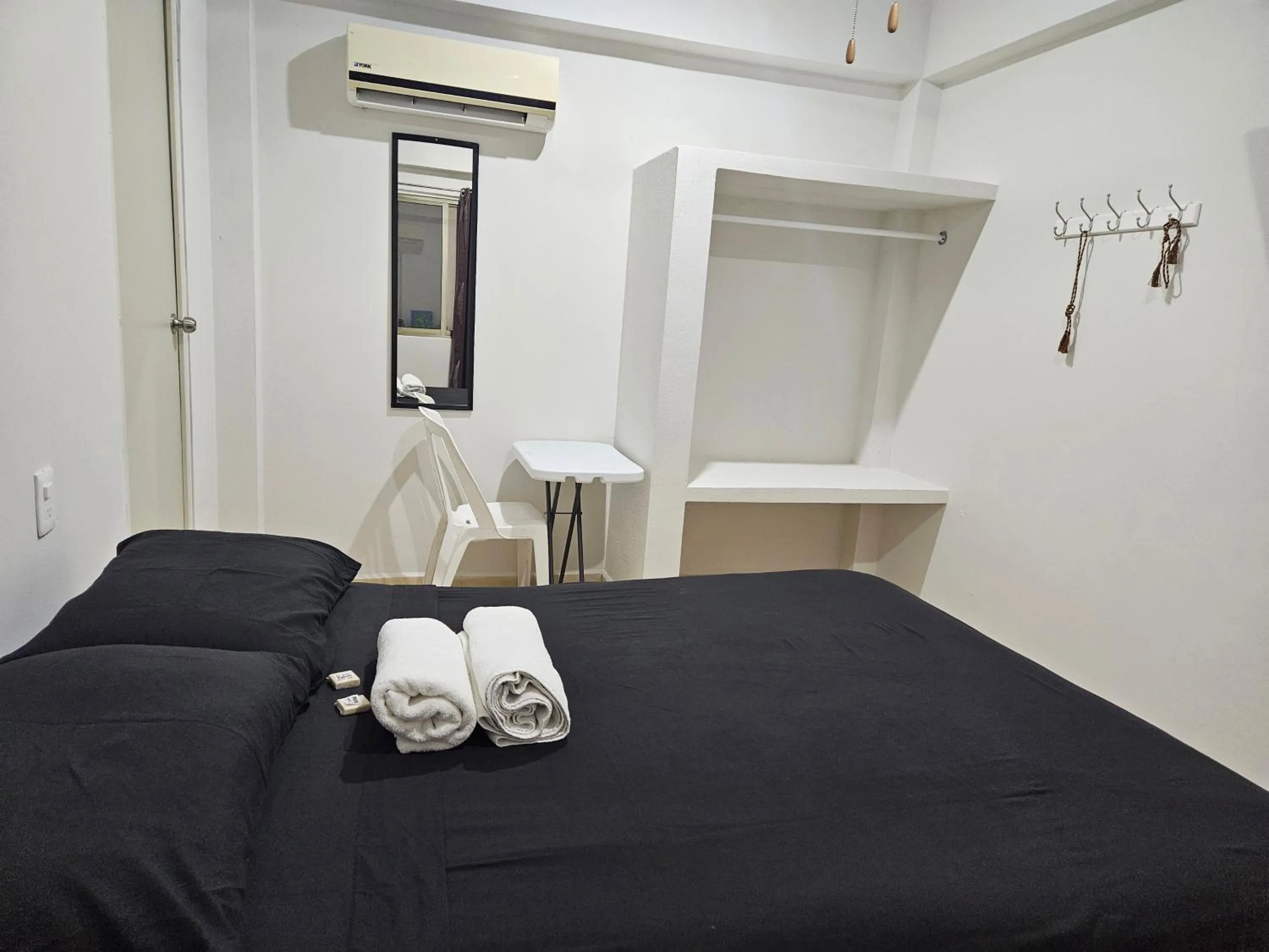 Photo of the whole room, Bed in El Padrino