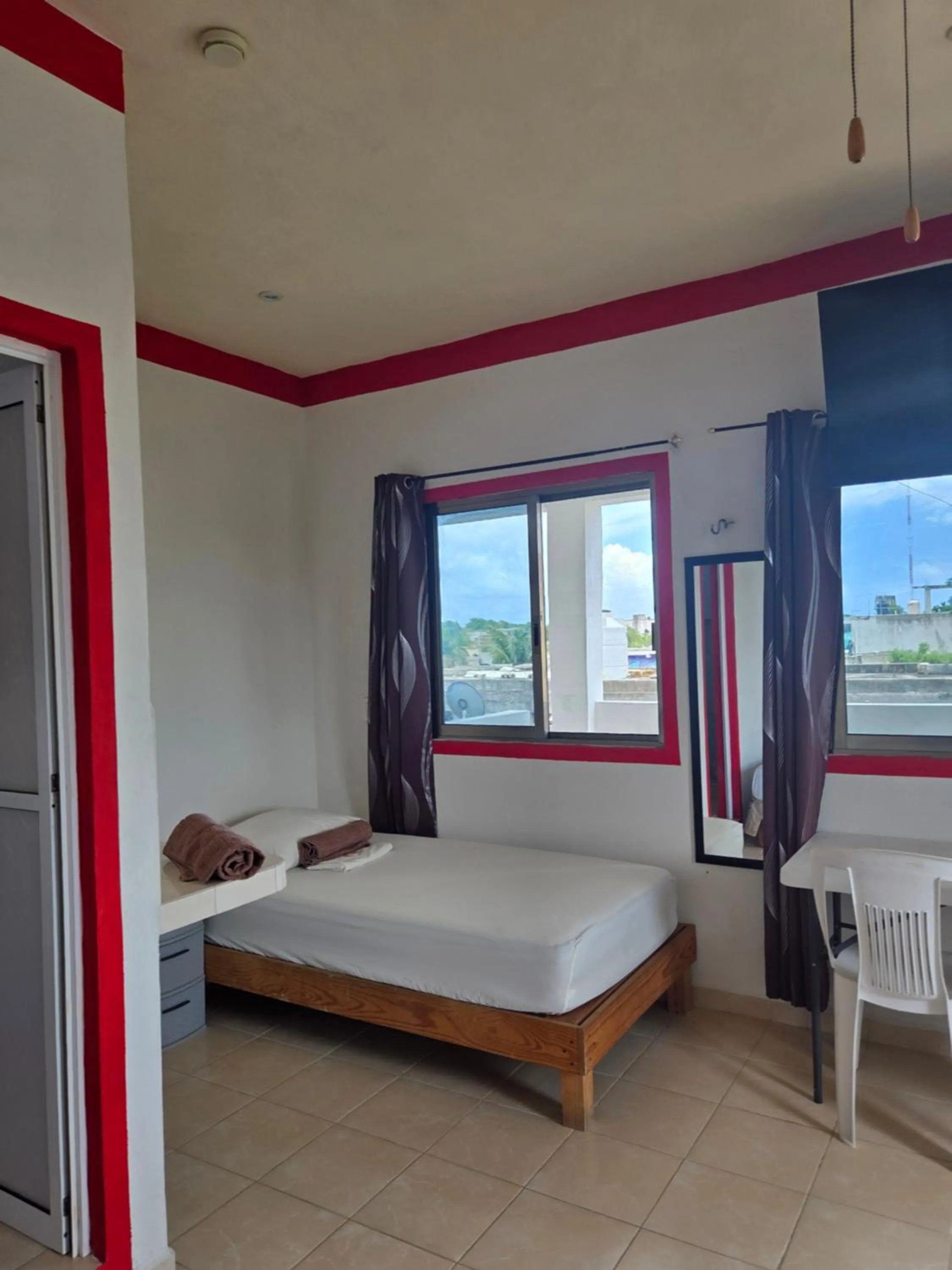 Photo of the whole room, Bed in El Padrino