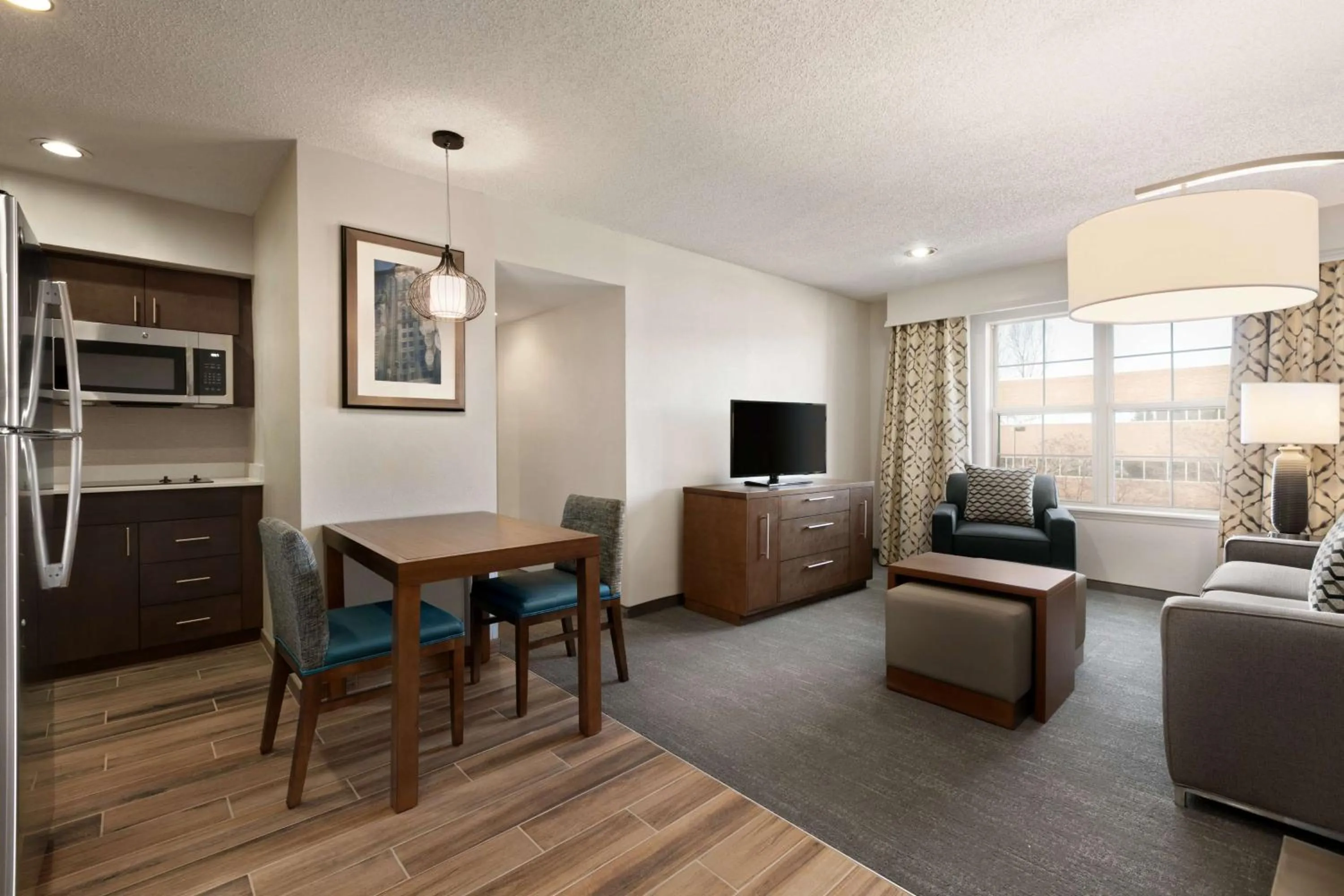Living room, Bed in Homewood Suites by Hilton Greensboro