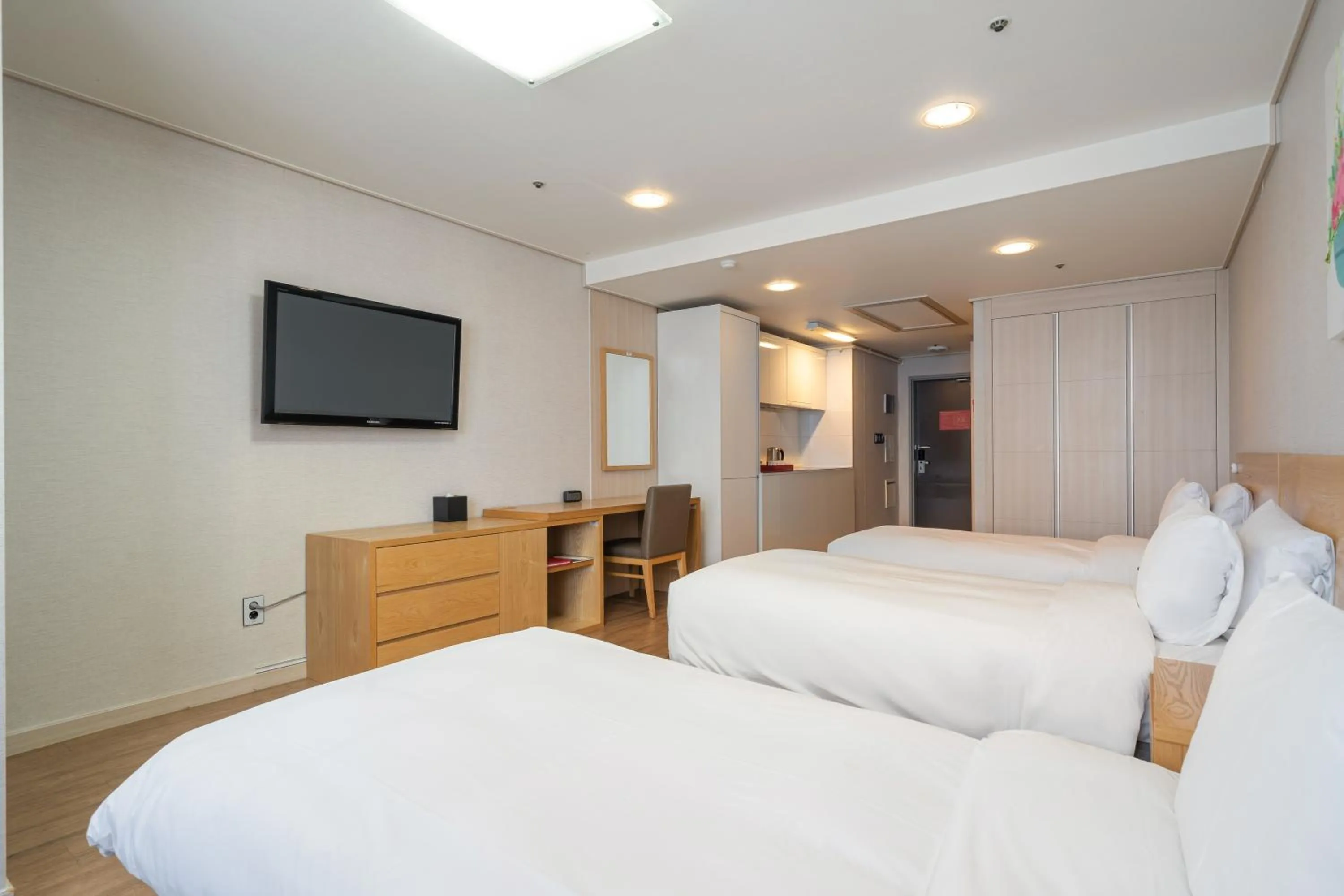 Bed in Ramada by Wyndham Seoul Dongdaemun