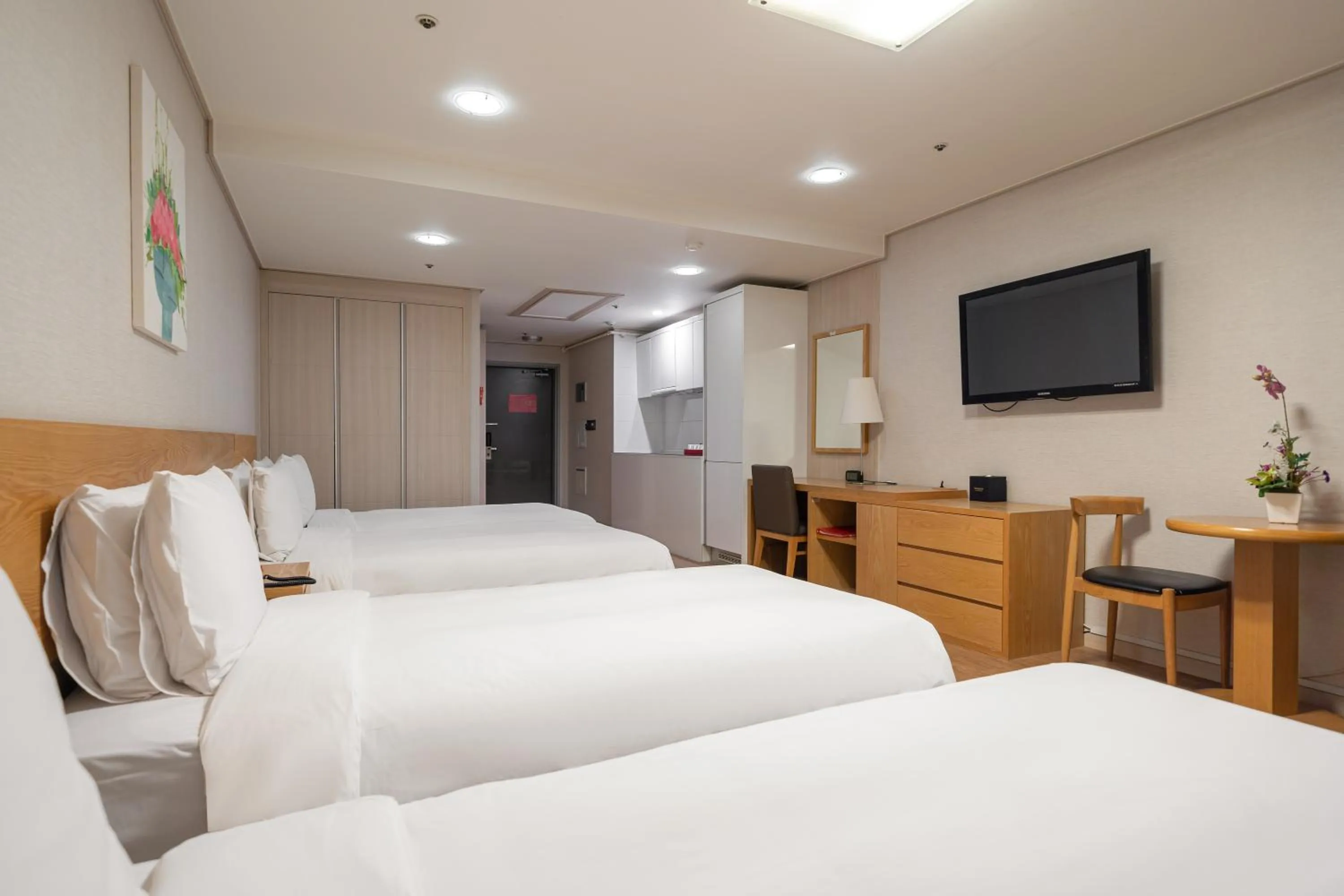 Bed in Ramada by Wyndham Seoul Dongdaemun