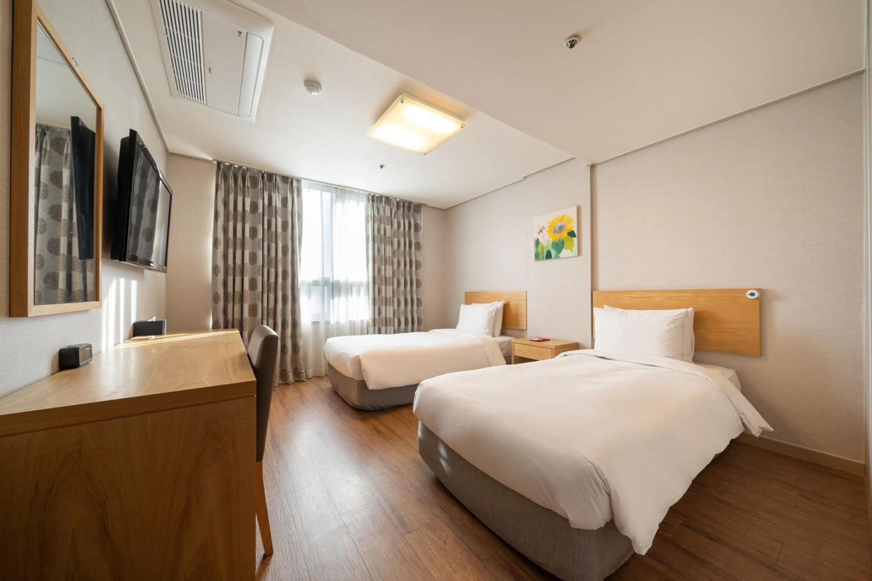 Bed in Ramada by Wyndham Seoul Dongdaemun