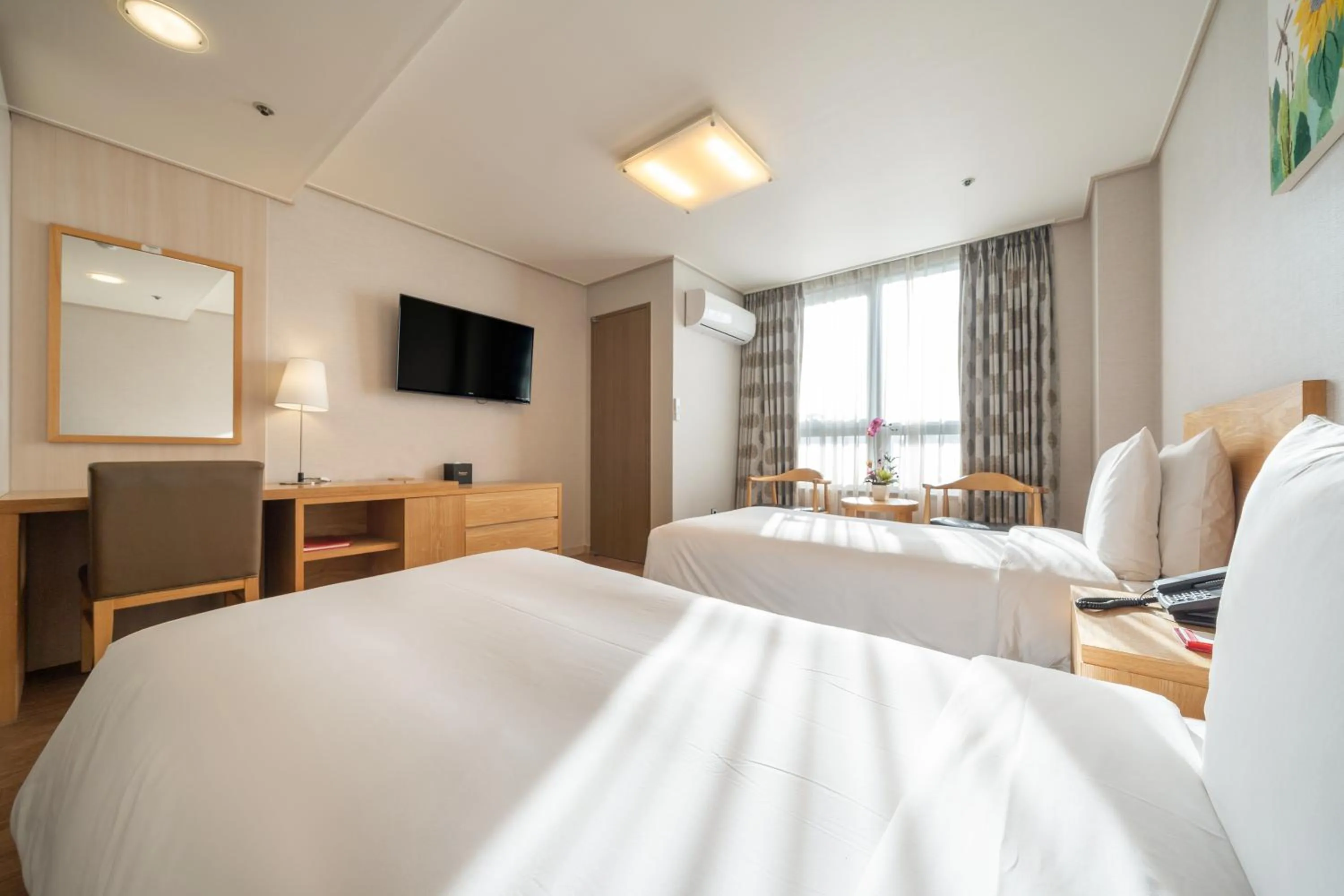 Bed in Ramada by Wyndham Seoul Dongdaemun