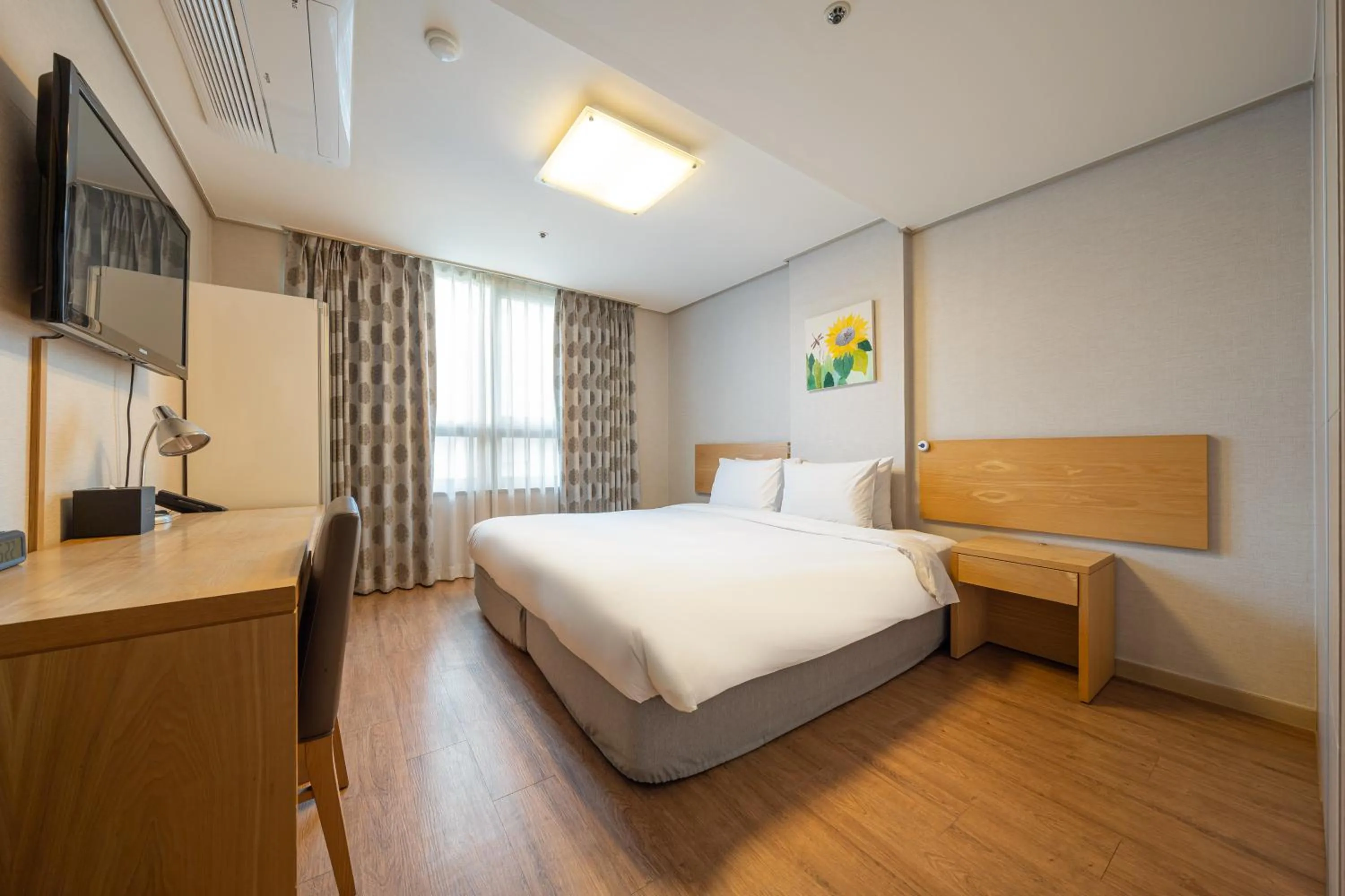 Bed in Ramada by Wyndham Seoul Dongdaemun