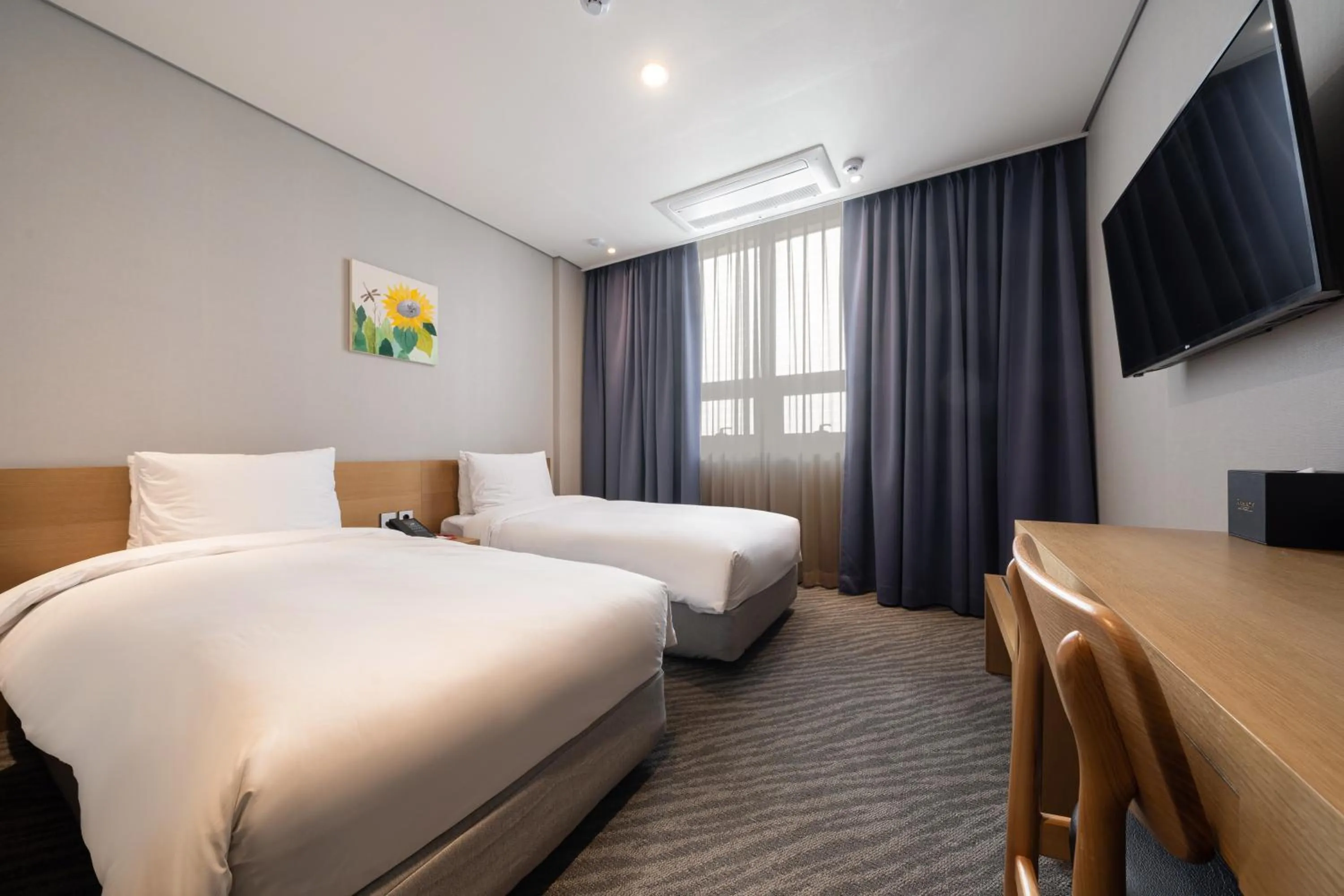 Bed in Ramada by Wyndham Seoul Dongdaemun