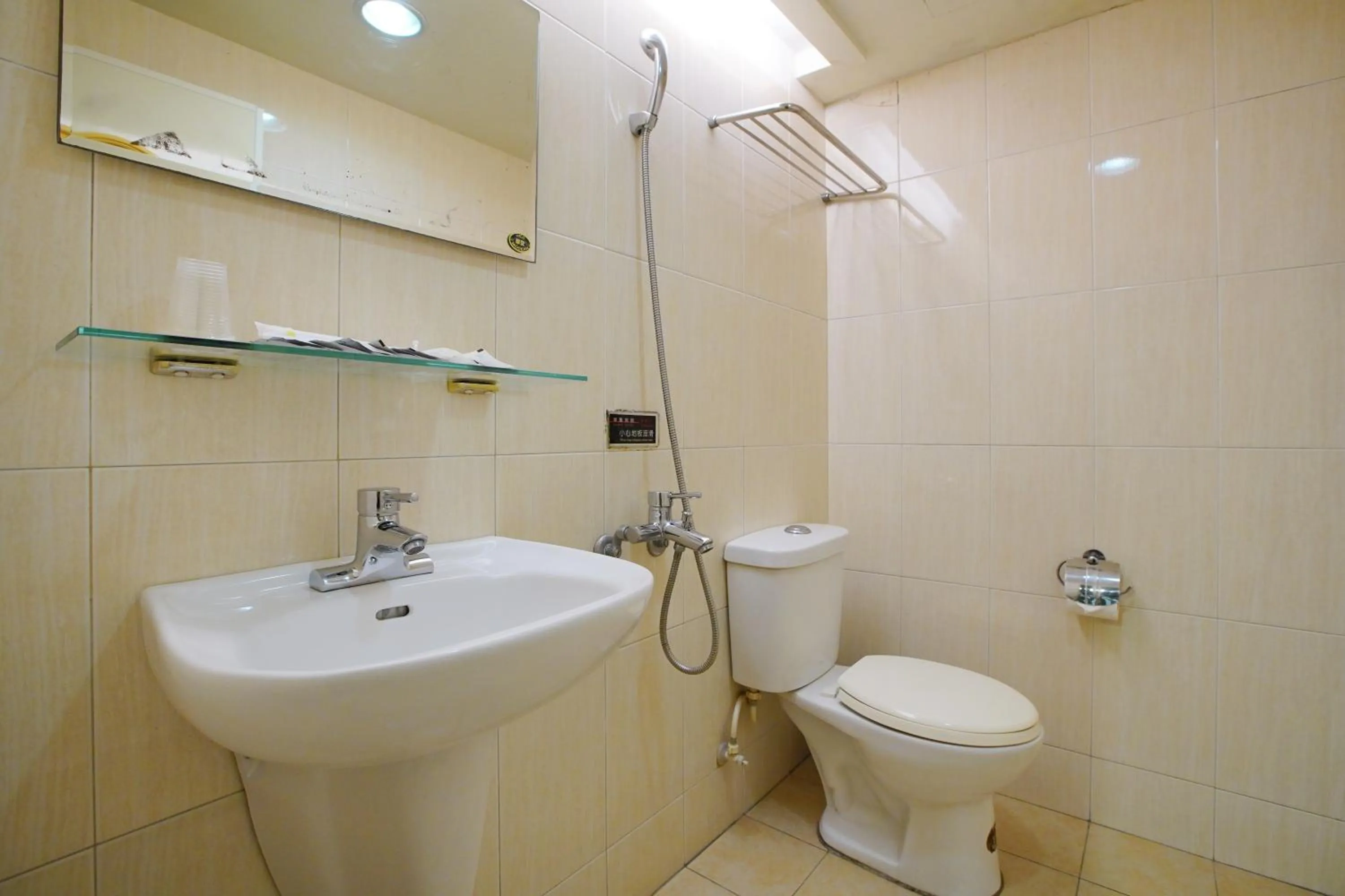 Bathroom in Happy Hotel