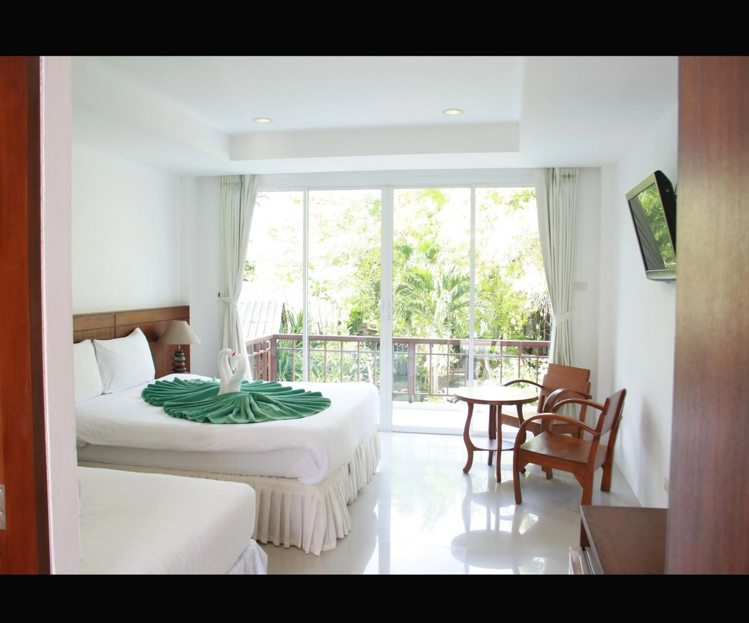 Bed in Kirati Beach Resort