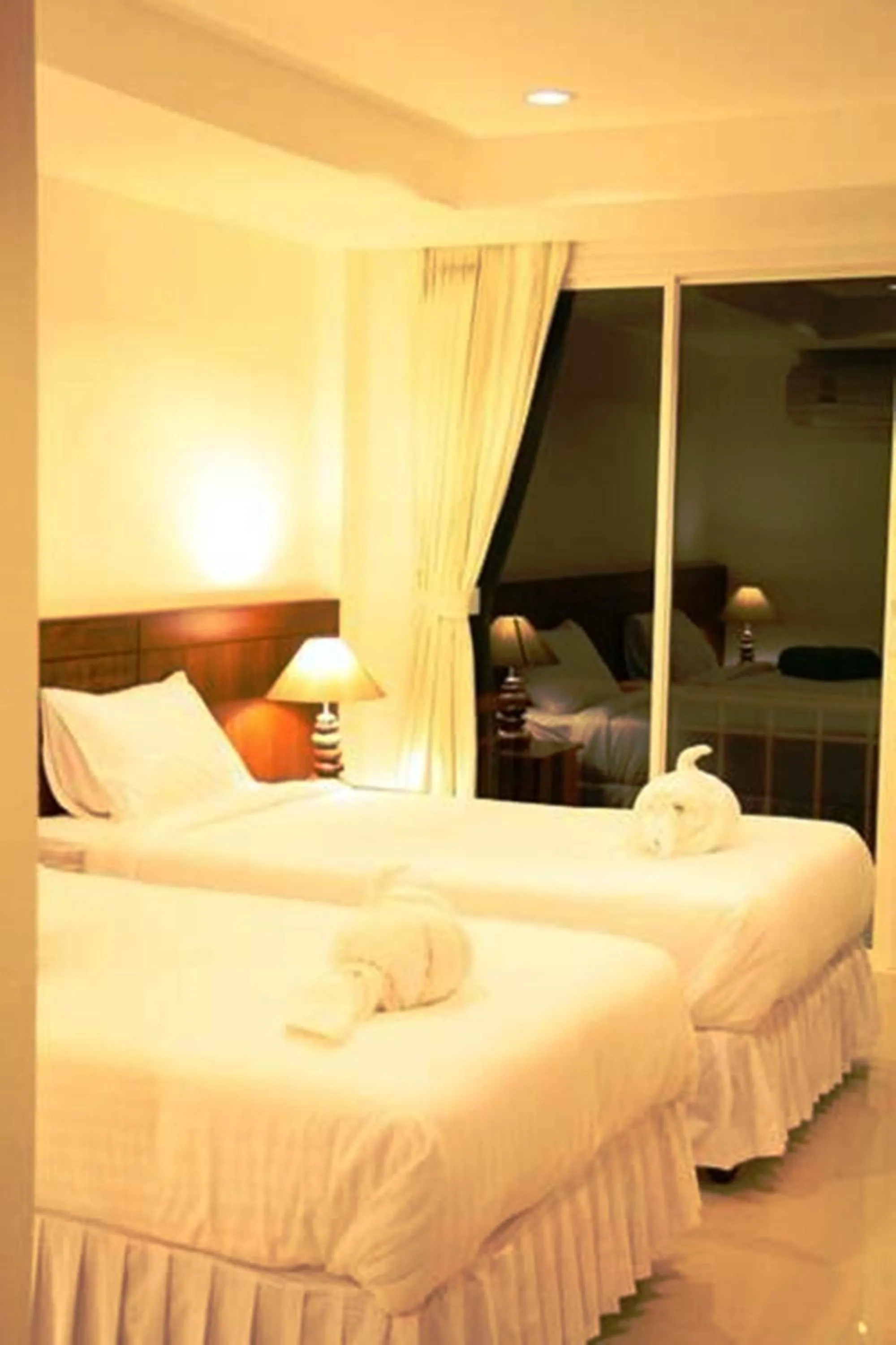 Bed in Kirati Beach Resort