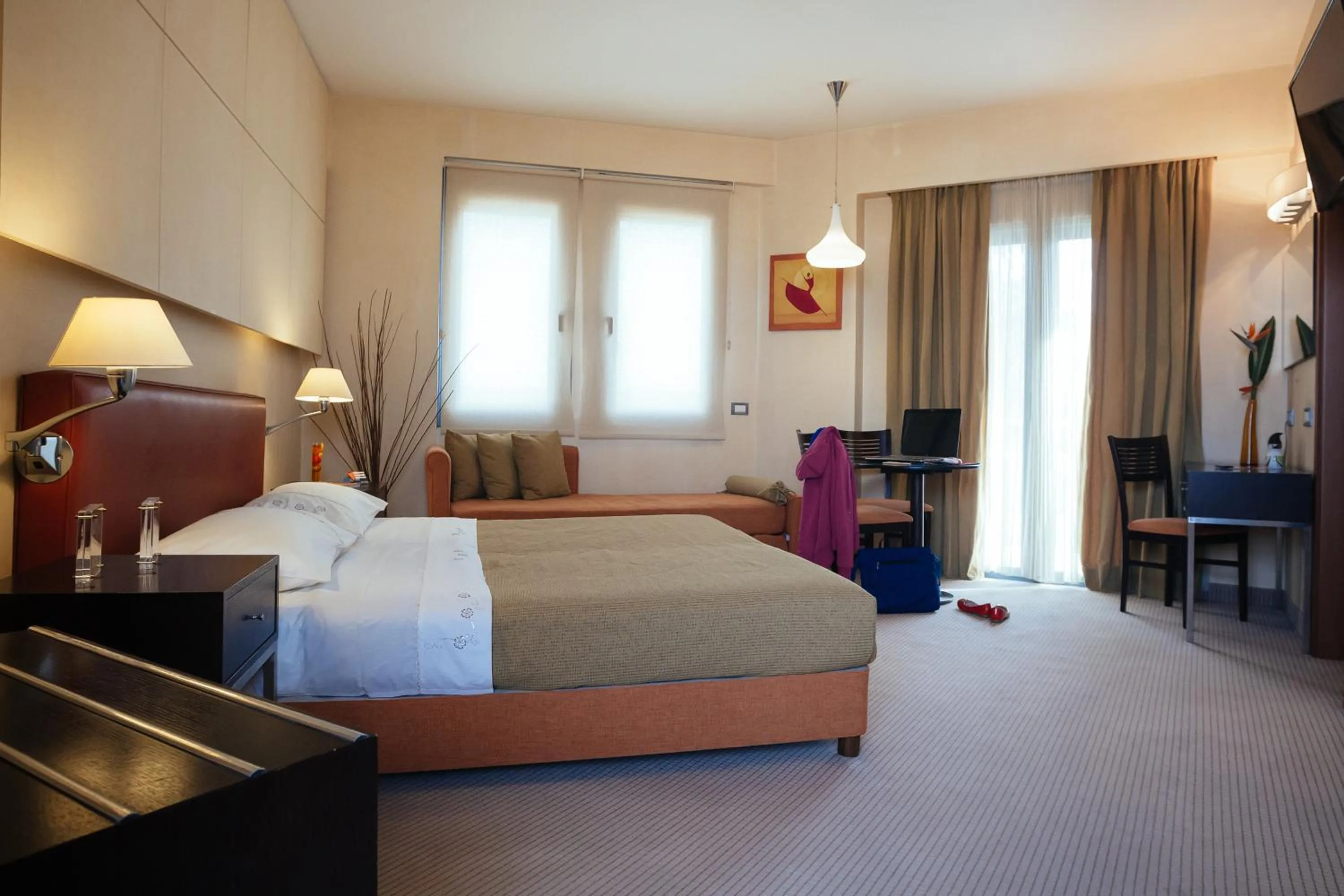 Living room, Bed in Alexandros Boutique Hotel