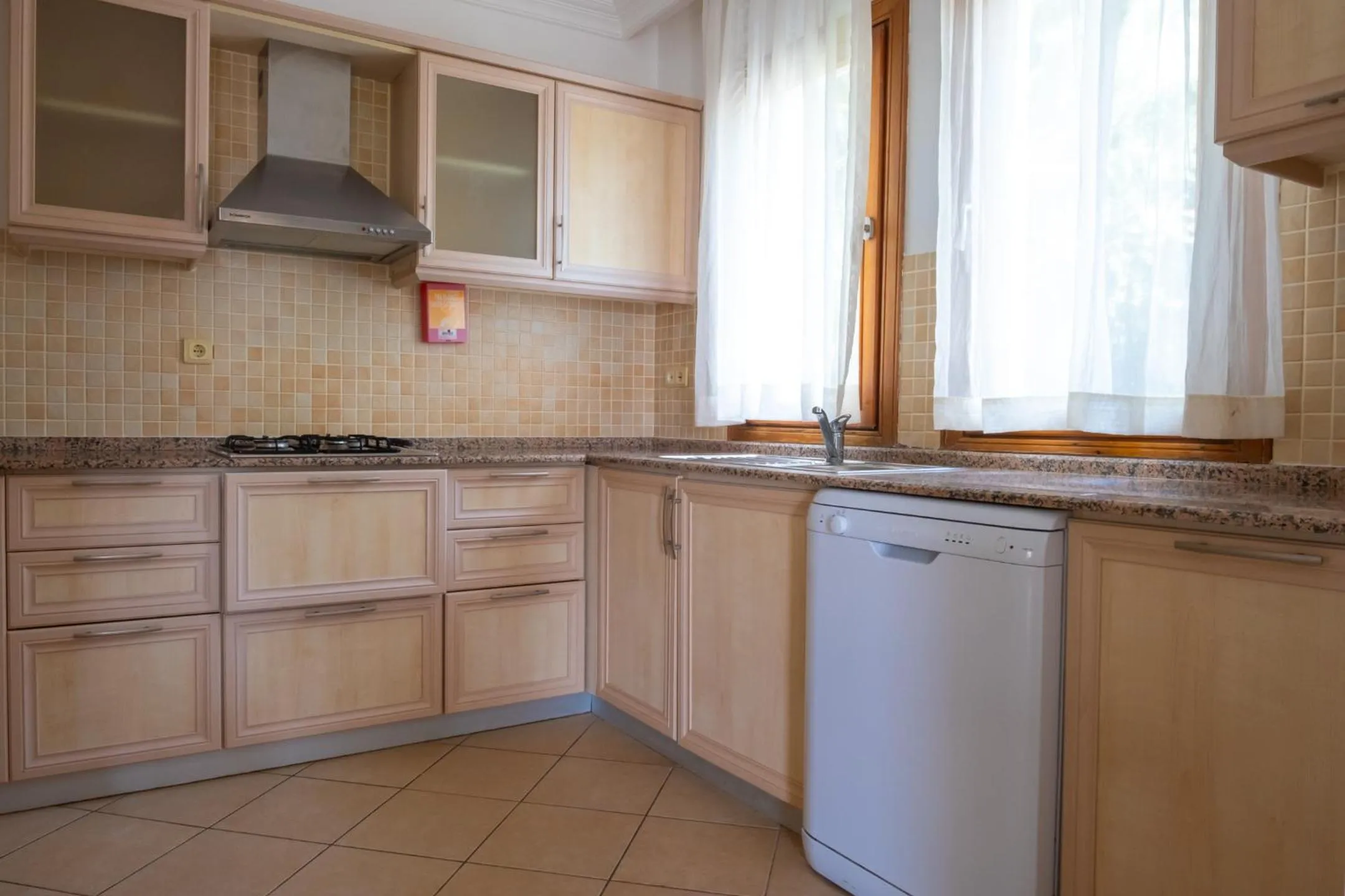 kitchen in Perdikia Hill Hotel And Villas
