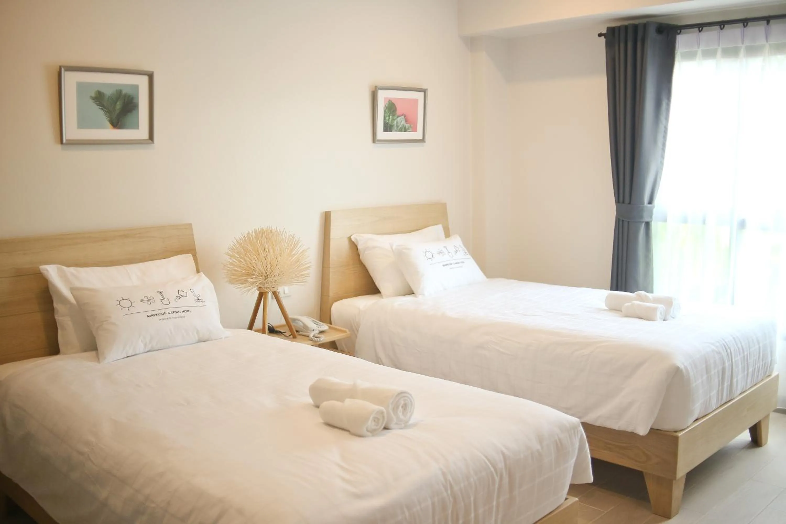 Bed in Bunprasop Garden Hotel