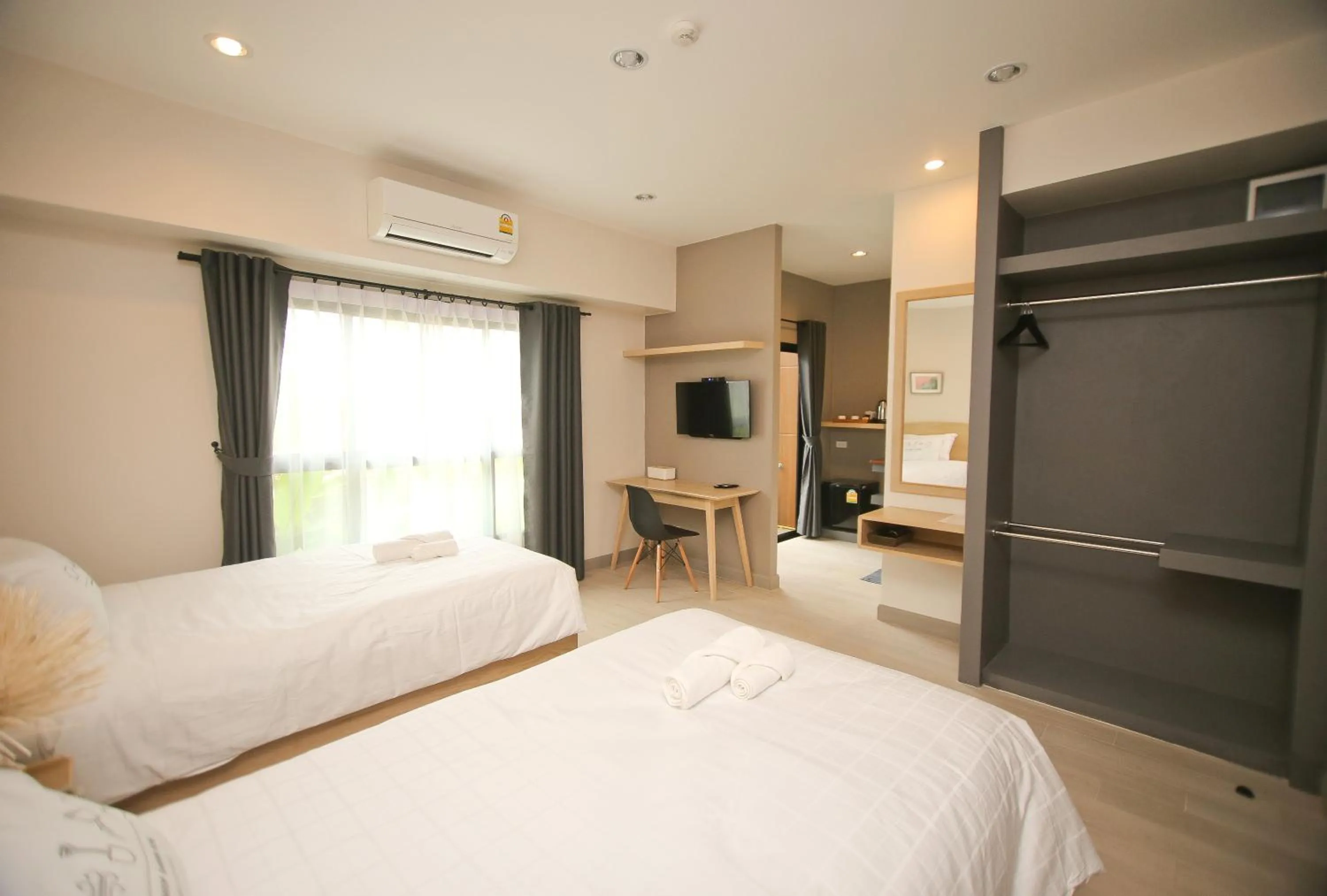 Bed in Bunprasop Garden Hotel