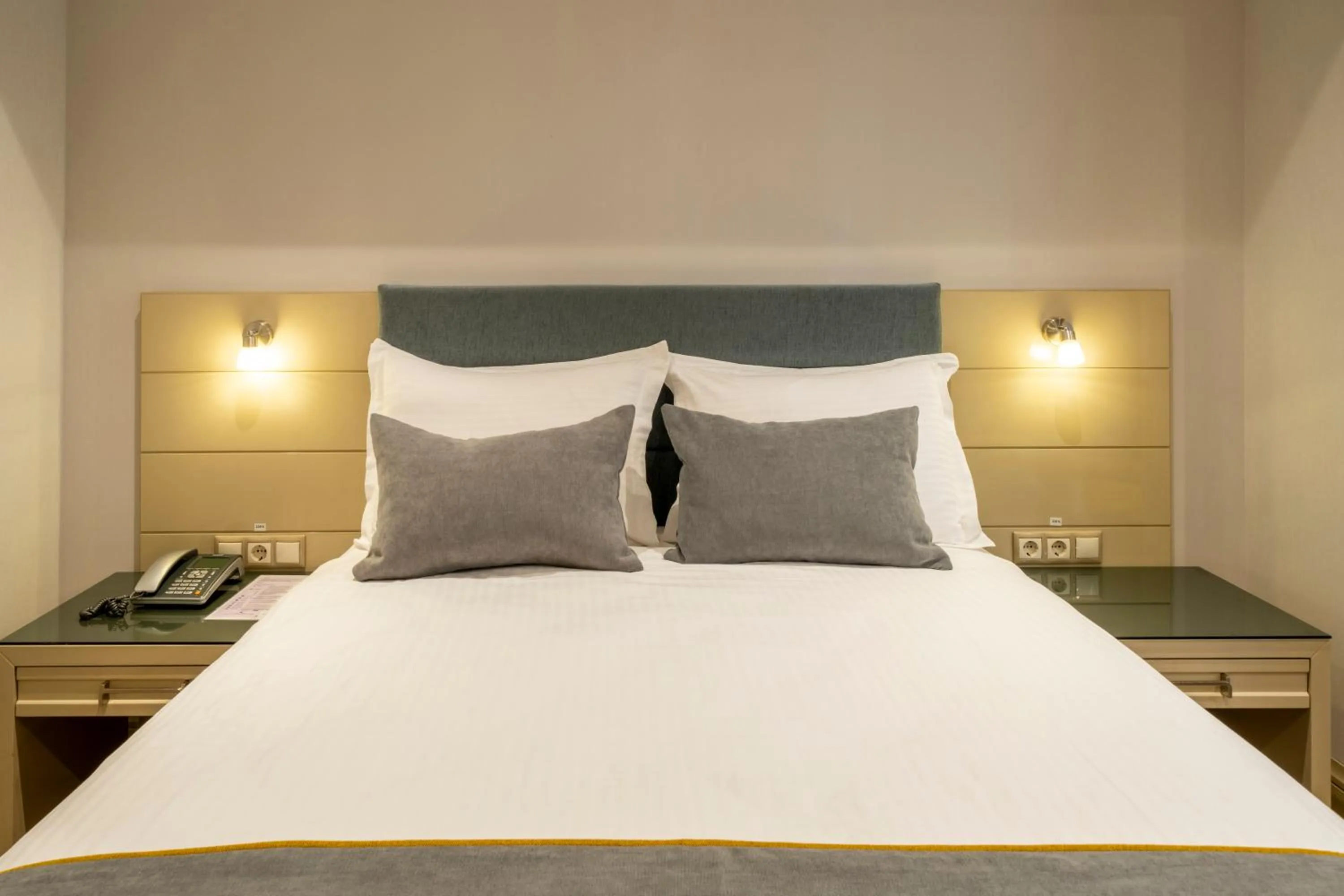 Bed in Amethyst Hotel