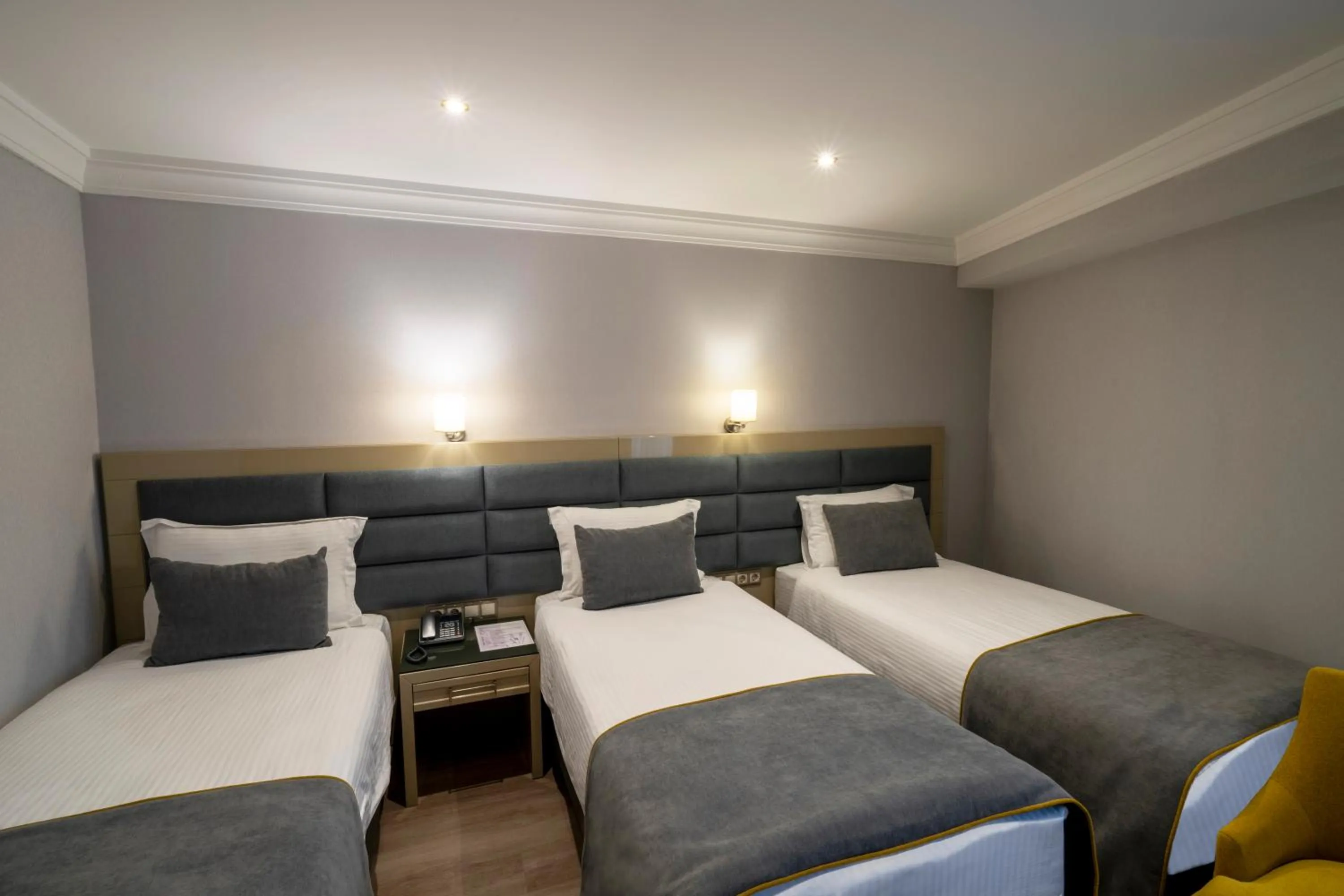 Bed in Amethyst Hotel