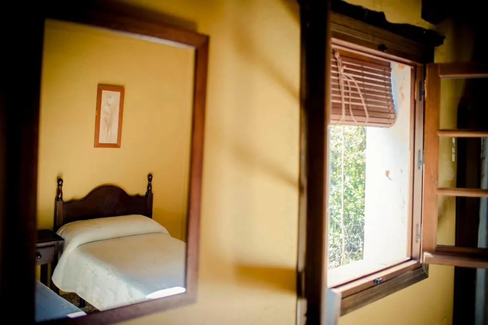 Decorative detail, Bed in Hotel Enrique Calvillo
