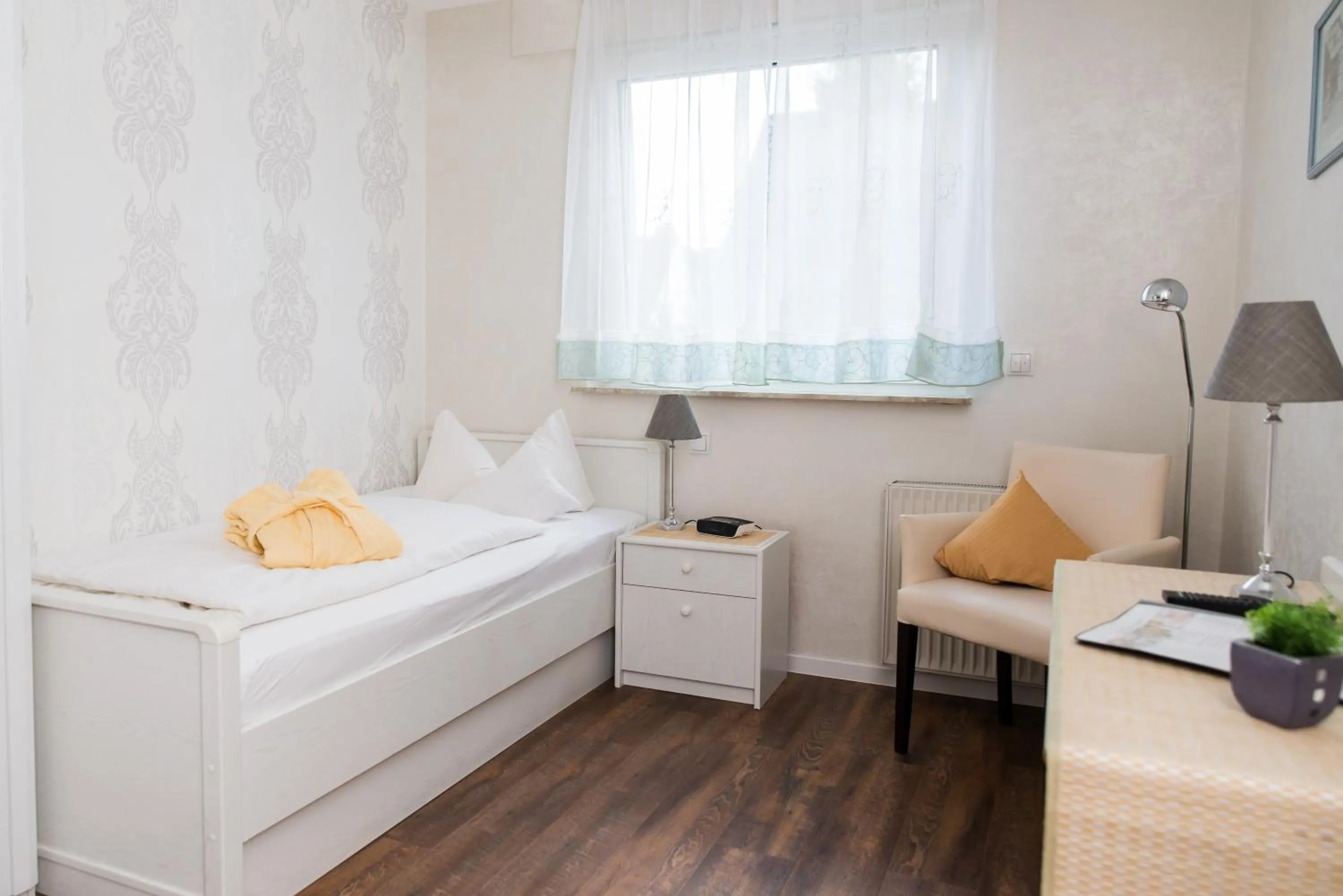 Photo of the whole room, Bed in PIEPers Hotel Garni