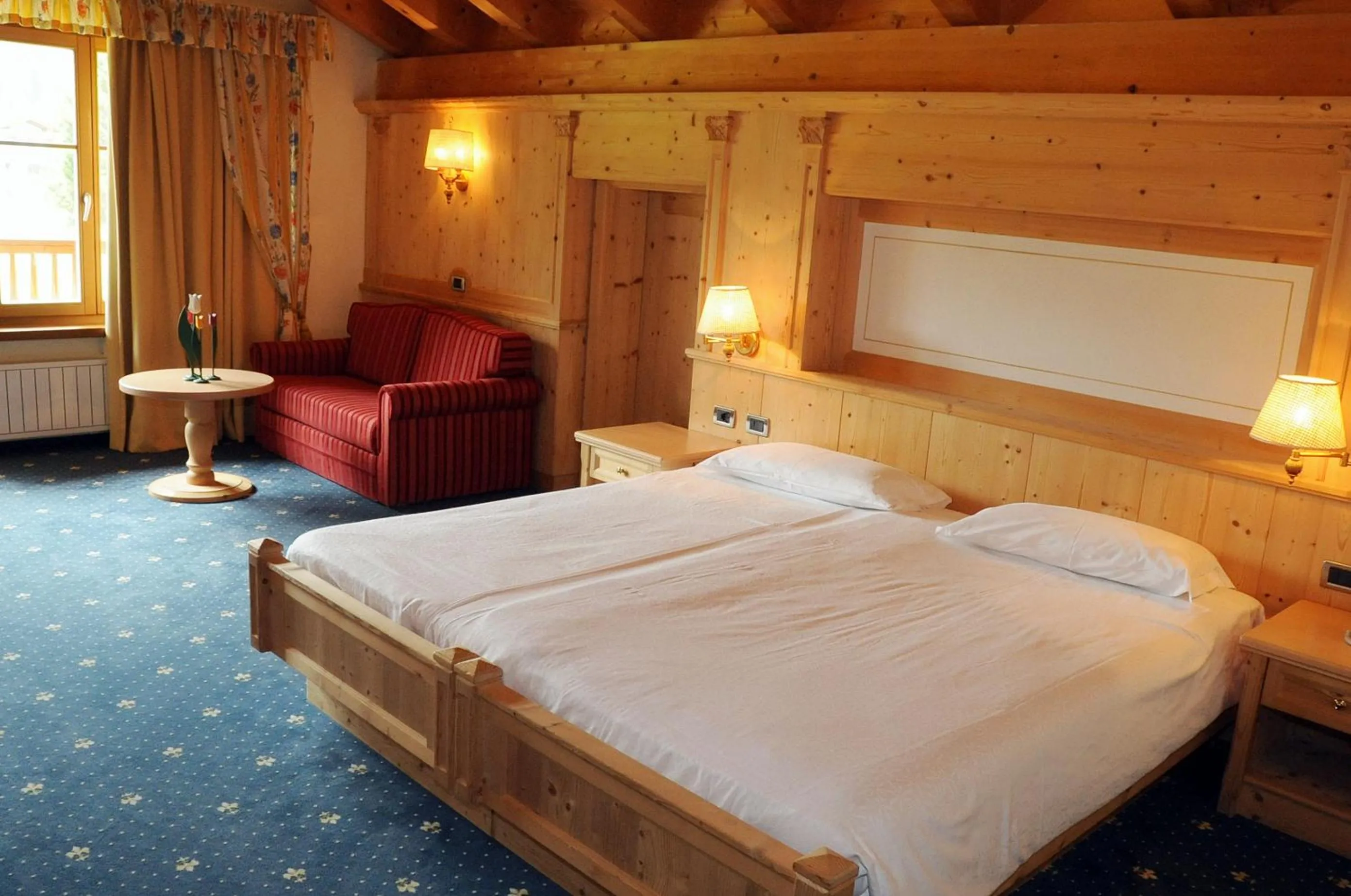 Bed in TH Corvara - Greif Hotel