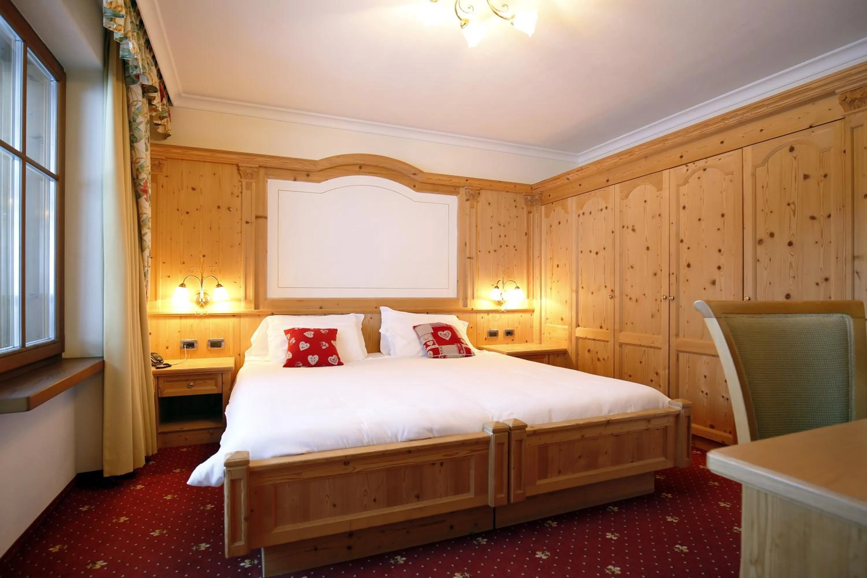 Bed in TH Corvara - Greif Hotel