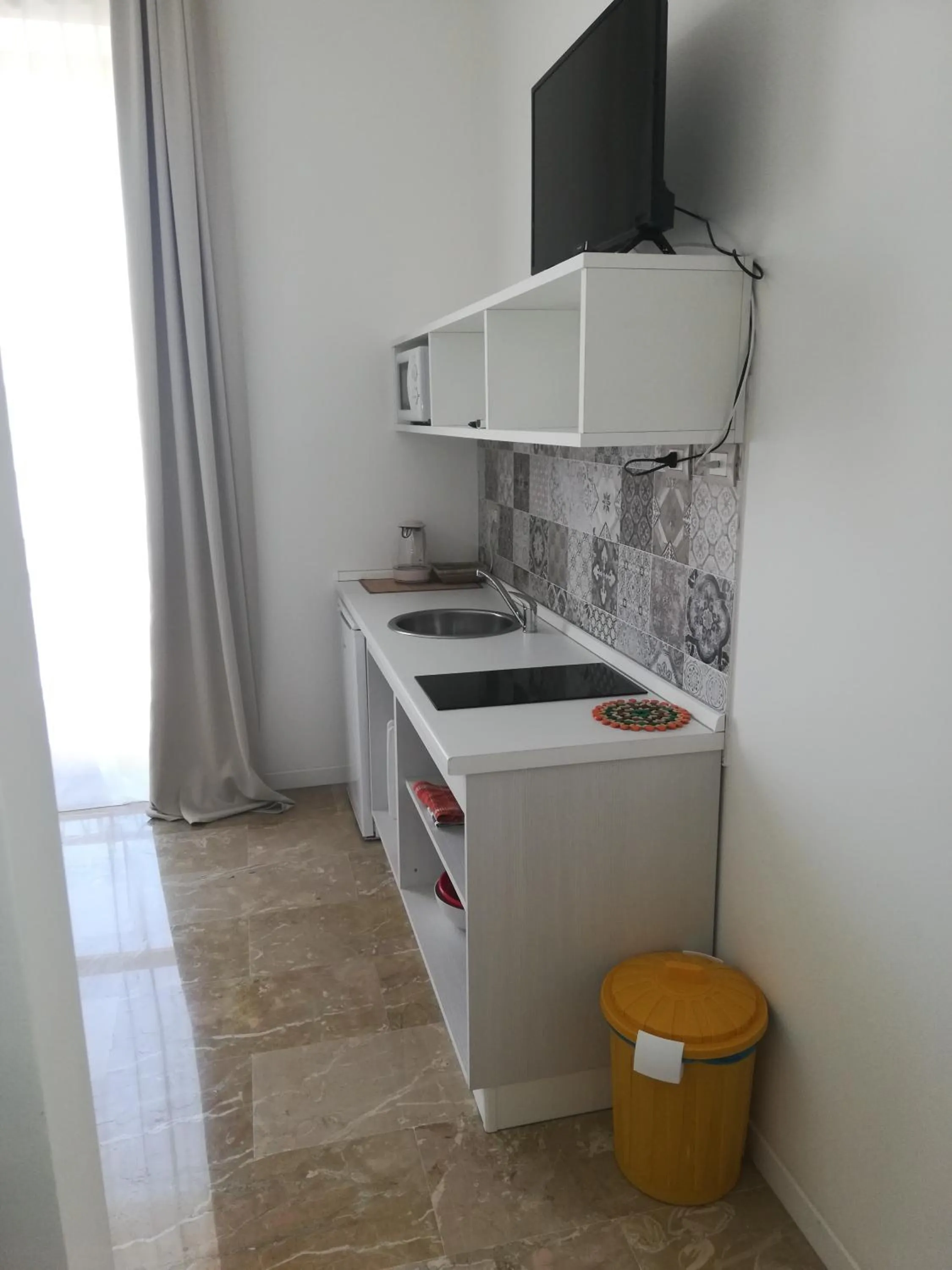 Kitchen or kitchenette in Archinuè