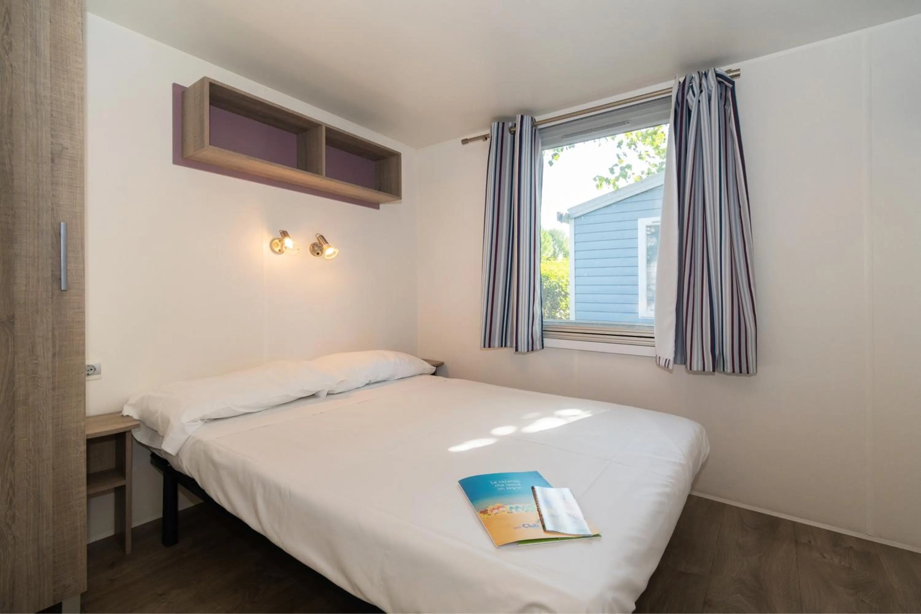 Bed in Club del Sole Adriano Family Camping Village