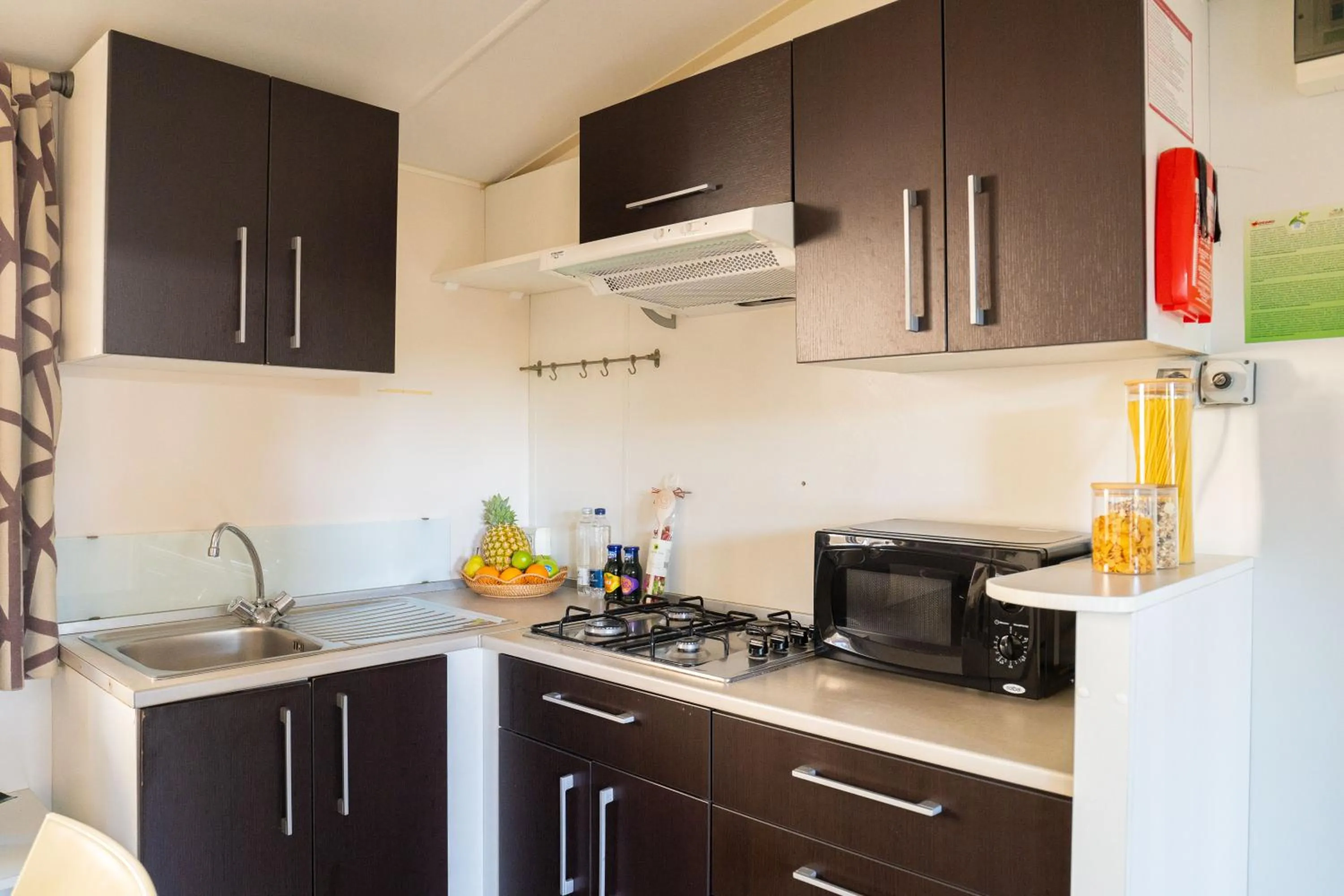 Kitchen or kitchenette in Club del Sole Adriano Family Camping Village