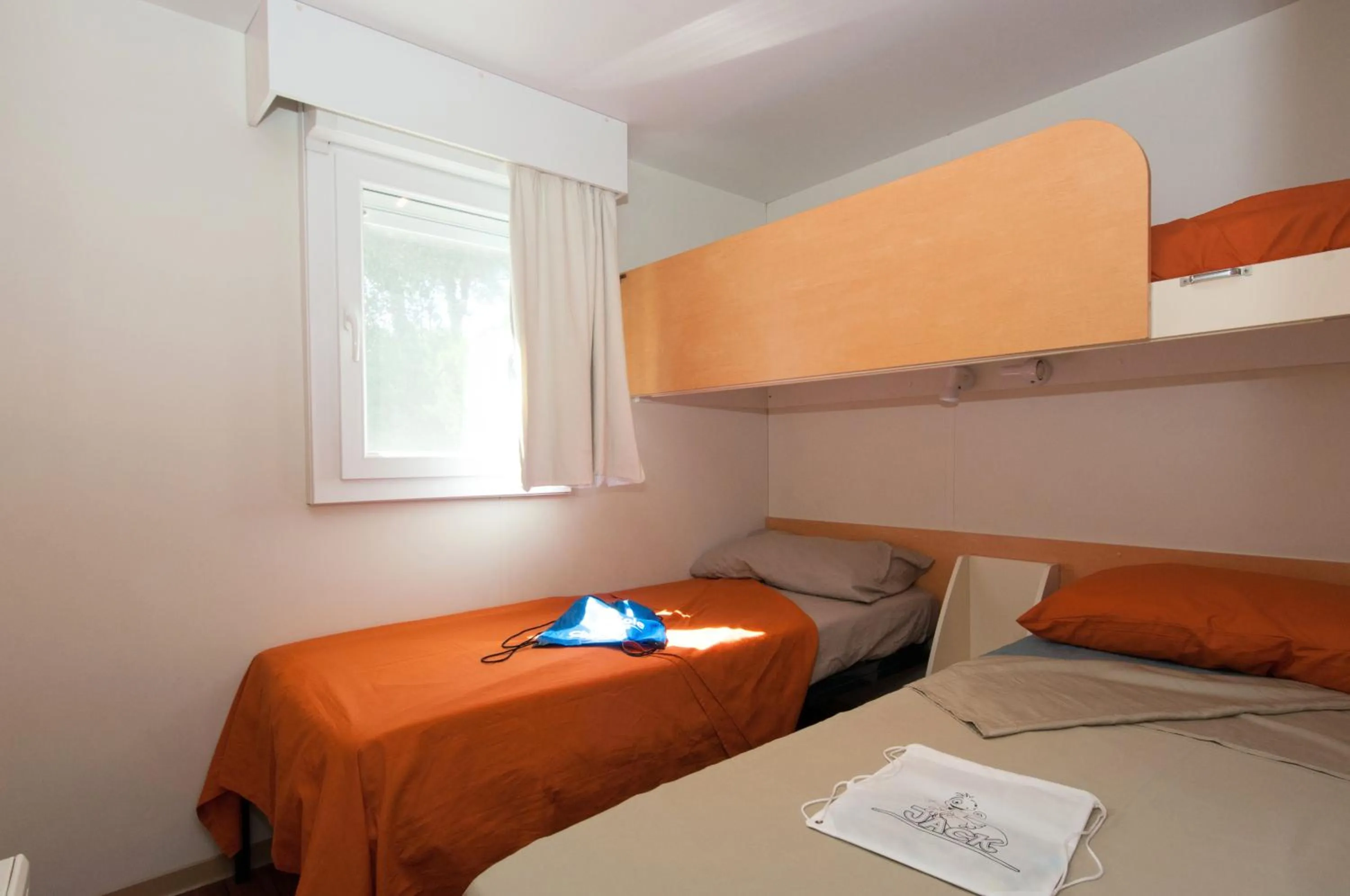 Bed in Club del Sole Adriano Family Camping Village