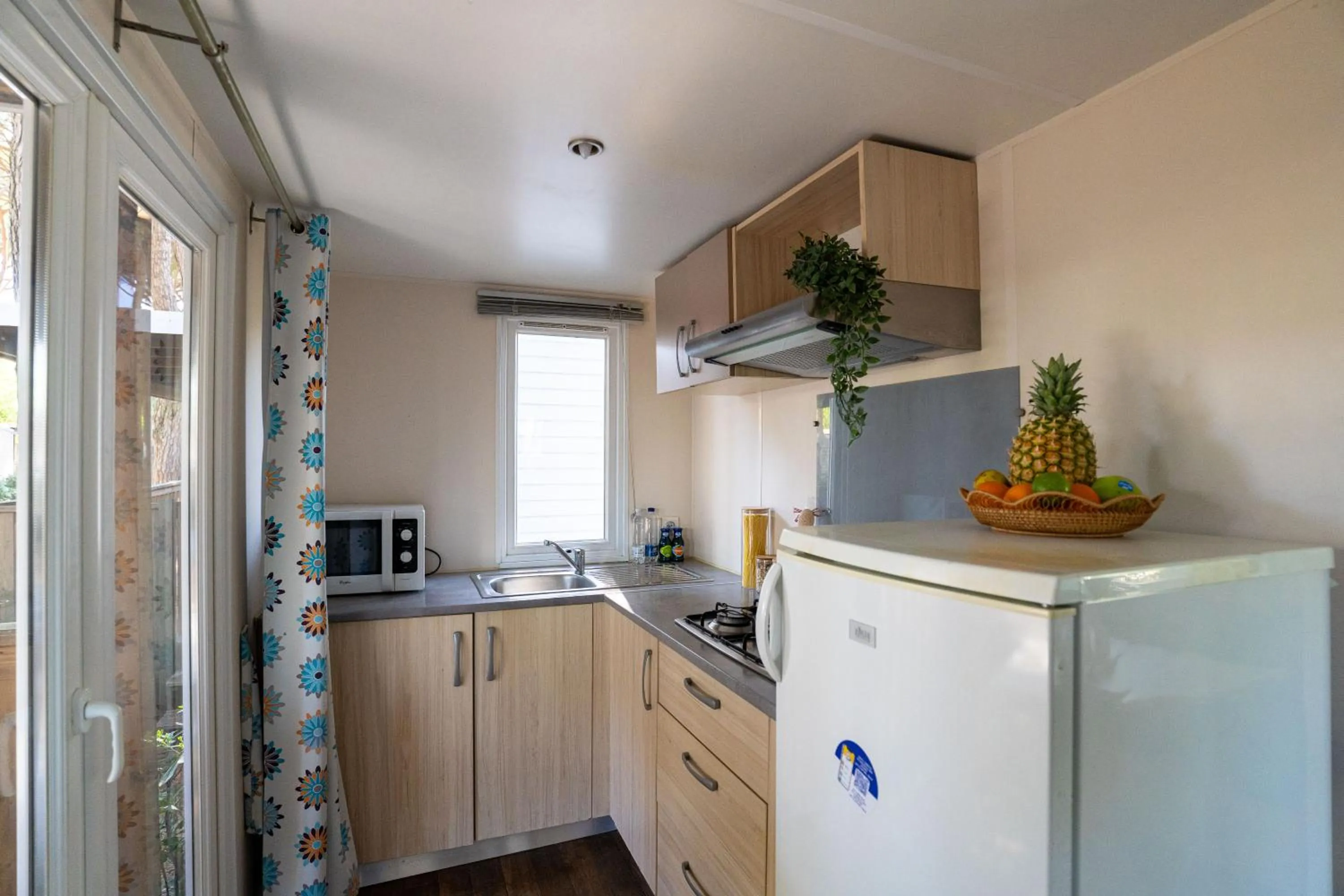 Kitchen or kitchenette in Club del Sole Adriano Family Camping Village