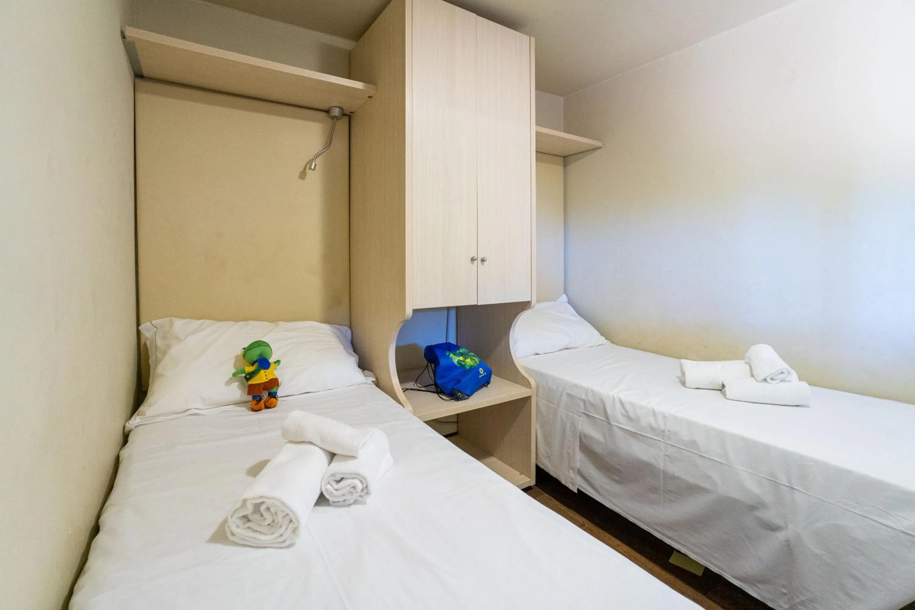 Bathroom, Bed in Club del Sole Adriano Family Camping Village