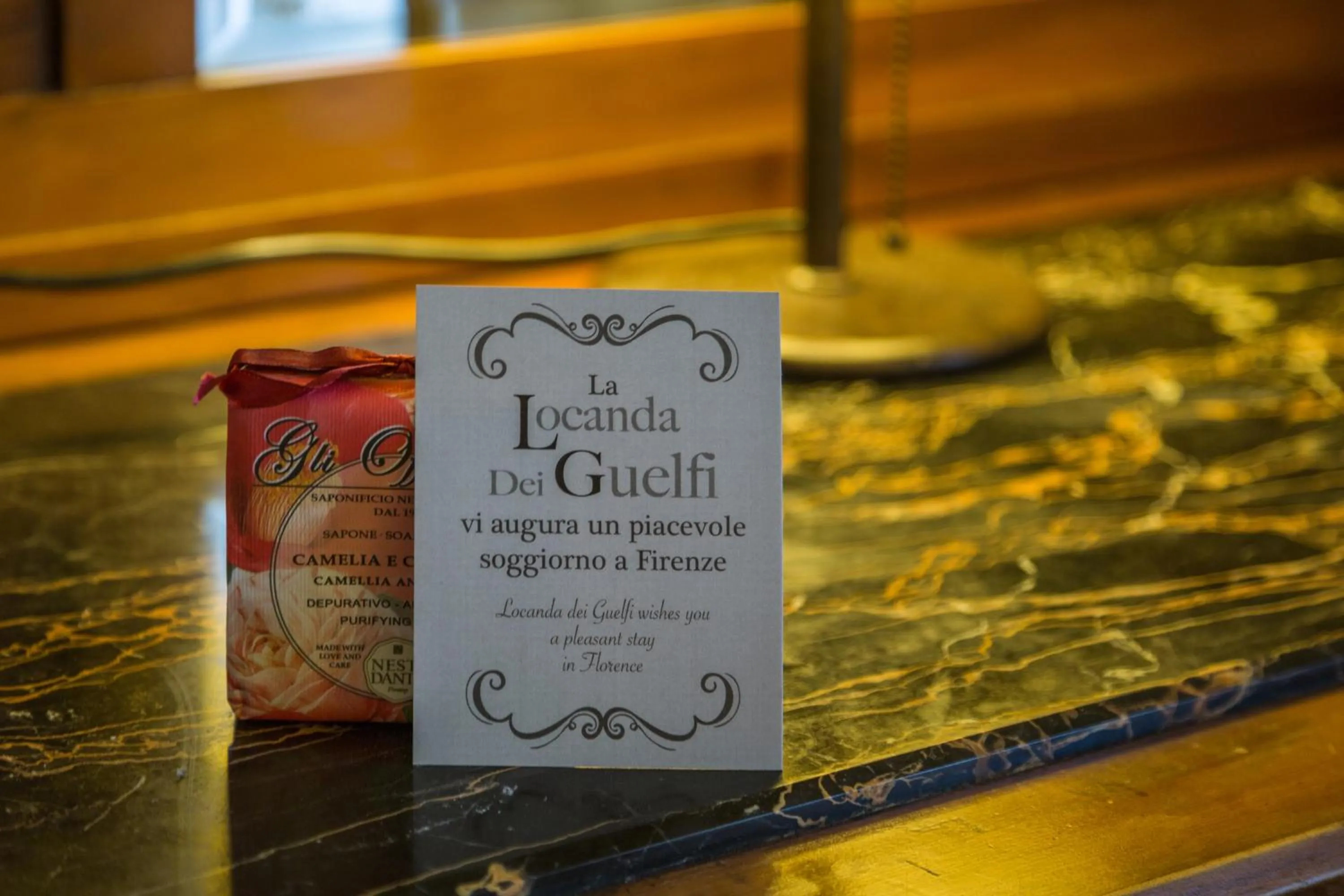 Text overlay in Locanda Dei Guelfi