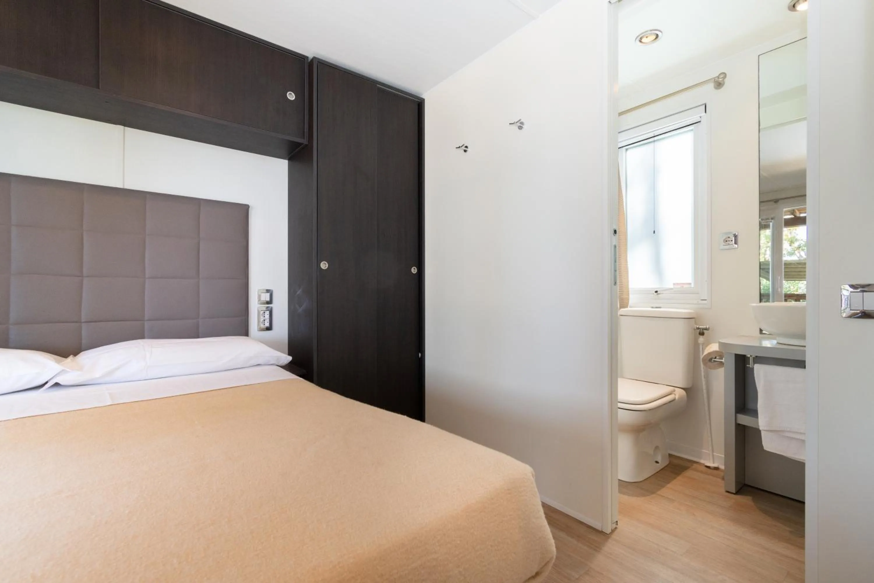 Bed in Club del Sole Spina Family Collection