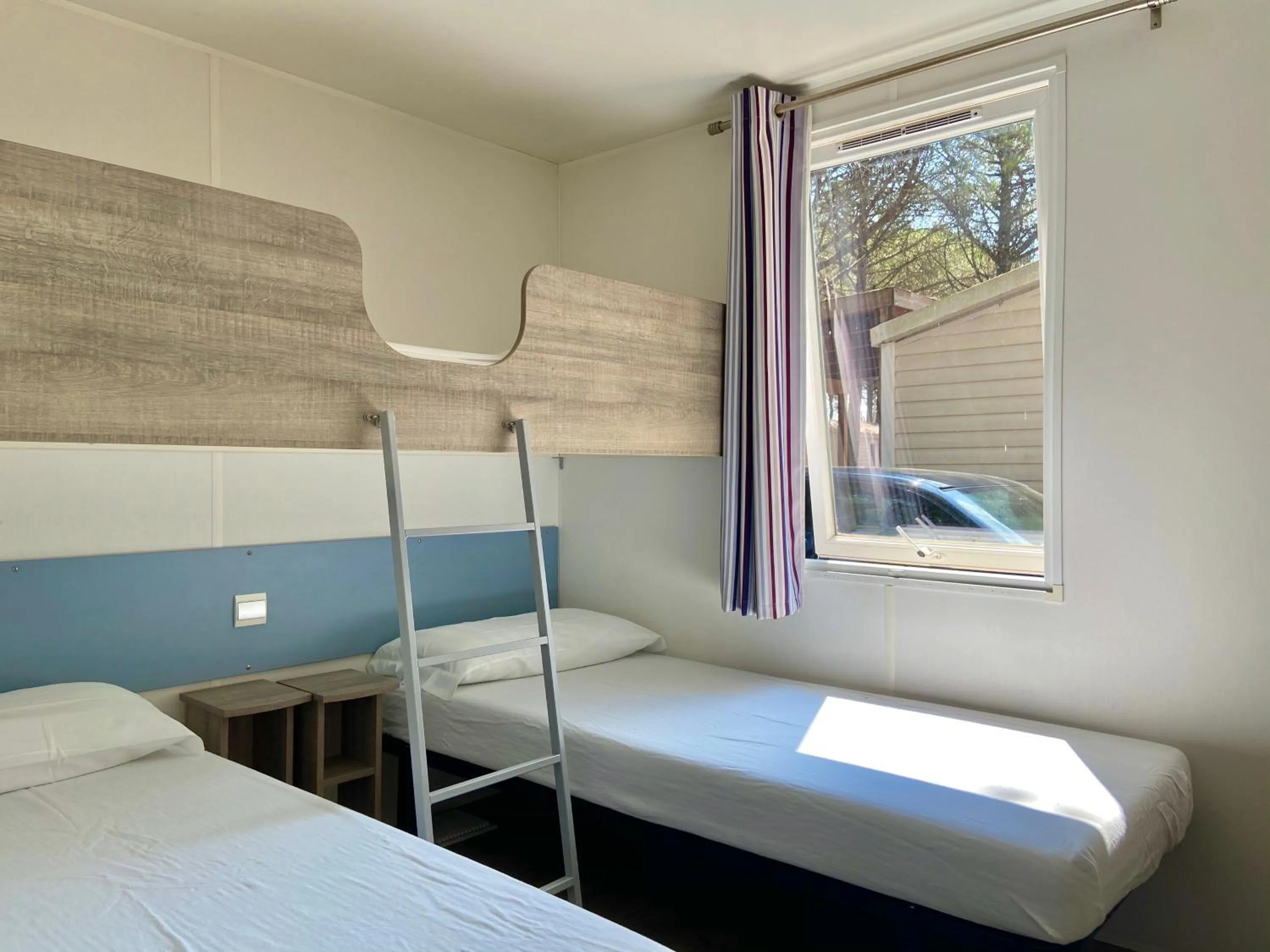 Bed in Club del Sole Spina Family Collection