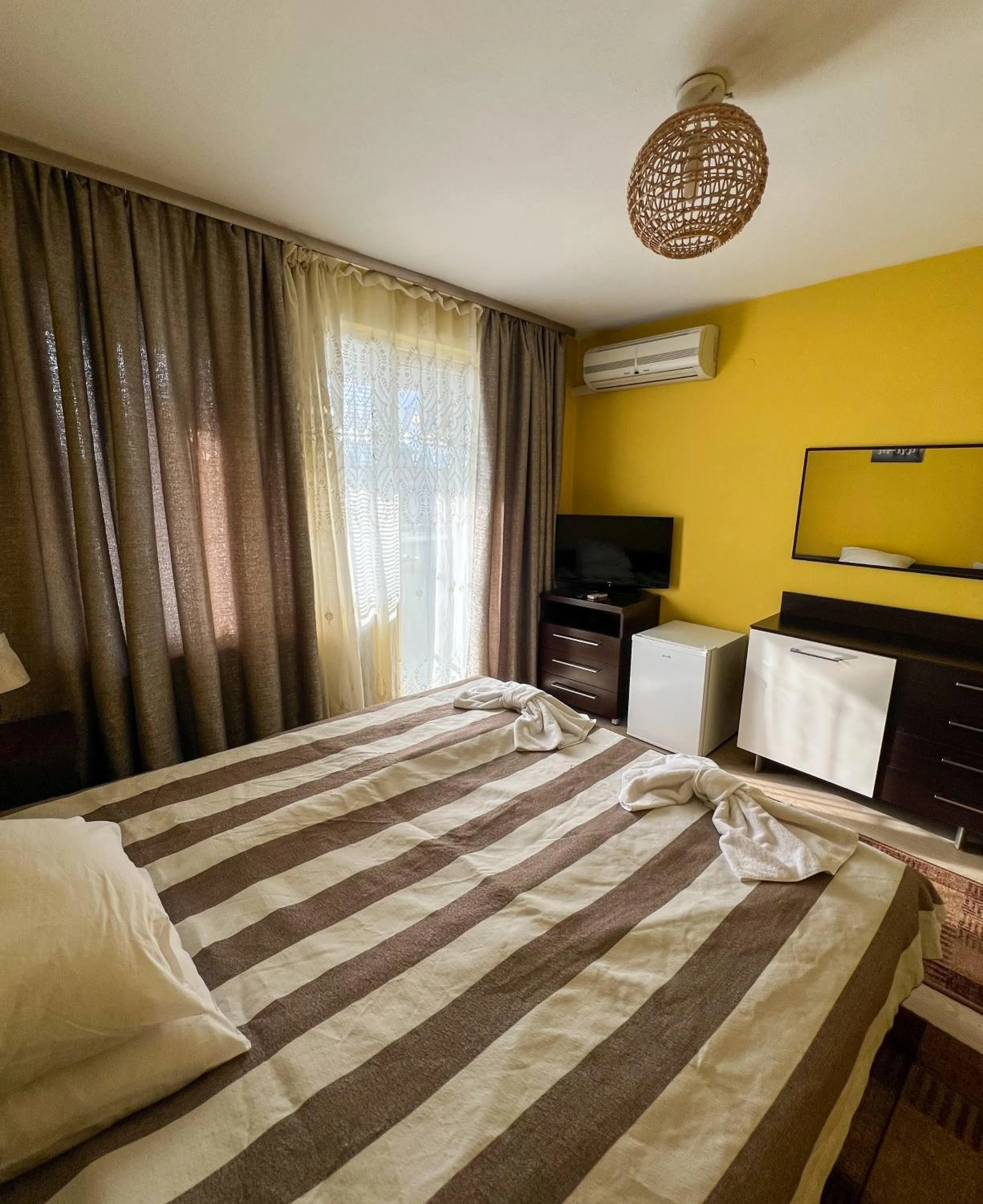 Bed in ALPHA family HOTEL