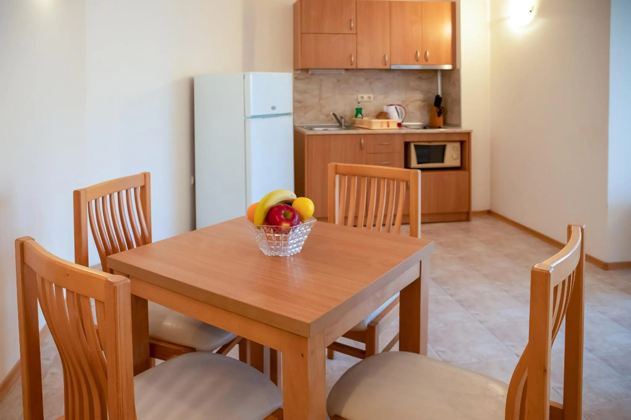 Kitchen or kitchenette in Apartment Tourist Complex Rose Village