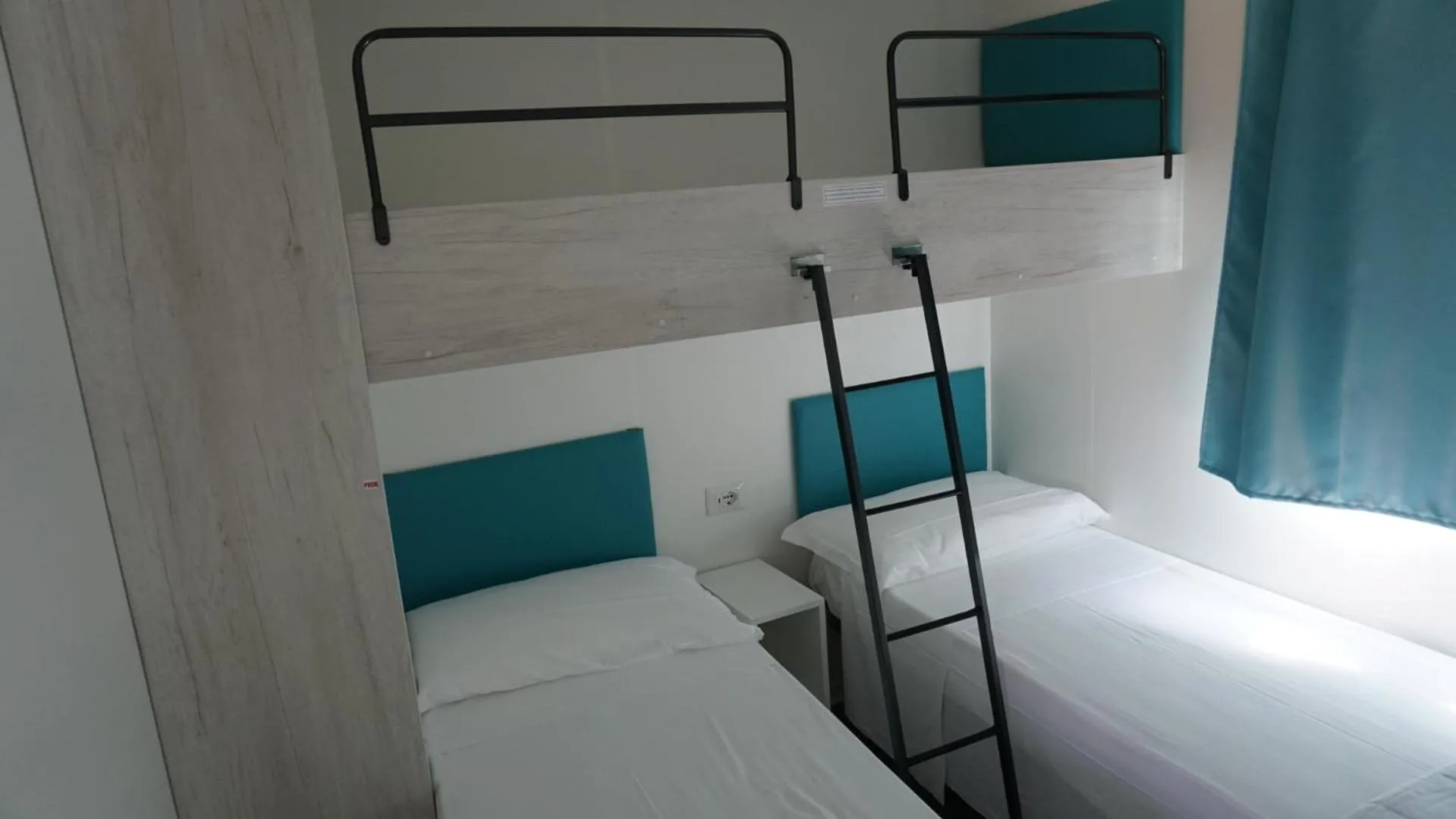 Photo of the whole room, Bed in Club del Sole Vigna sul Mar Family Collection