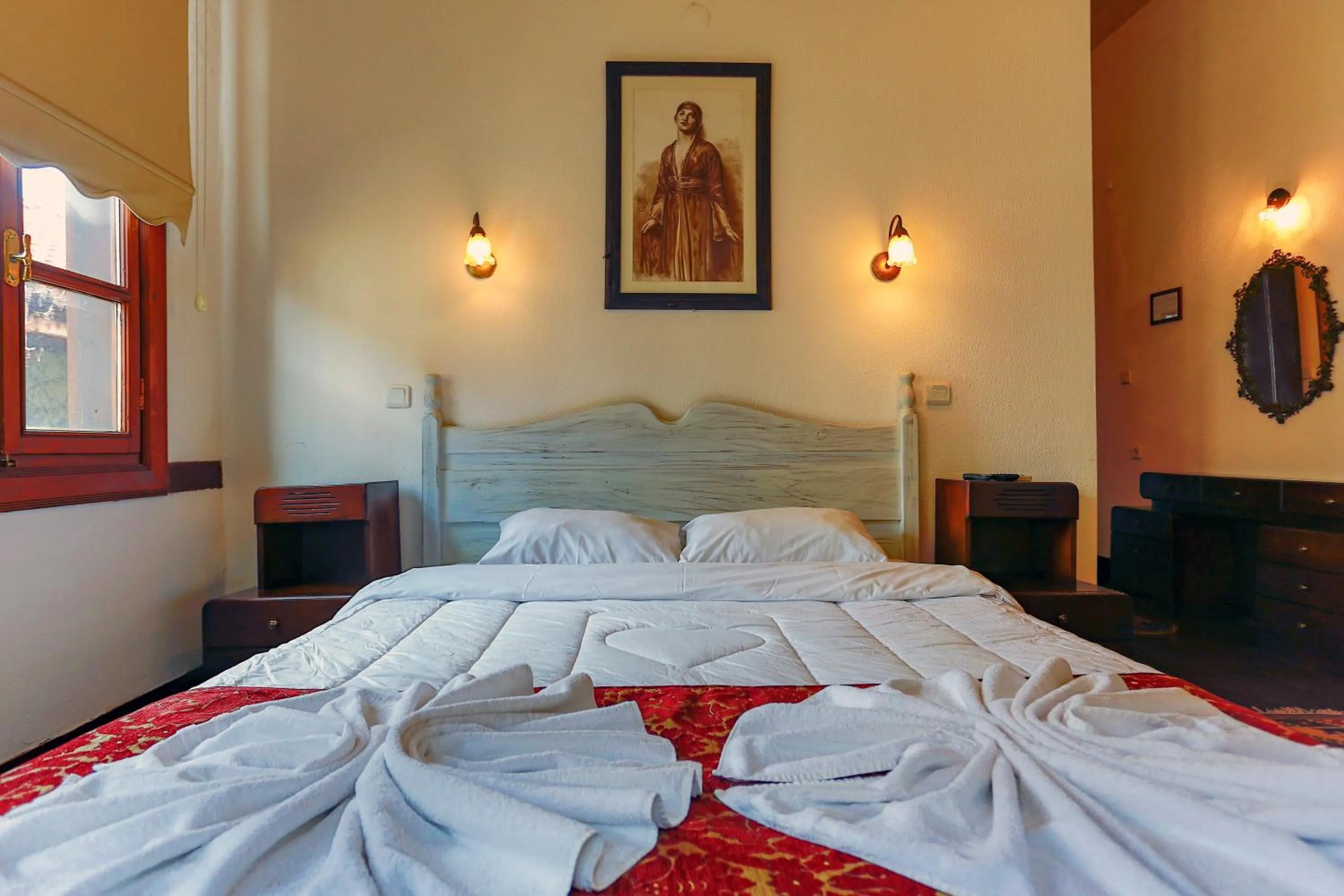 Bed in Atelya Art Hotel