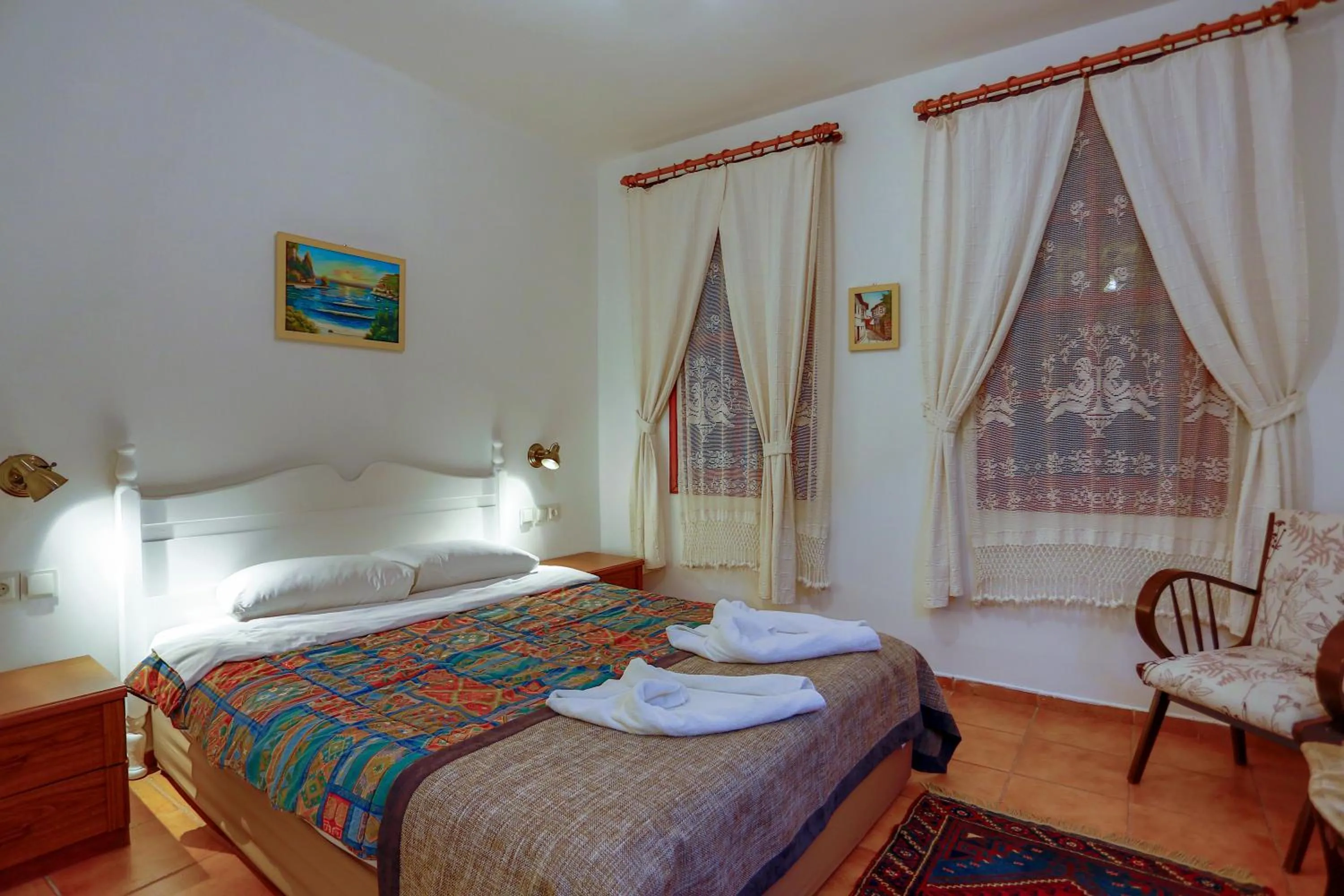 Bed in Atelya Art Hotel