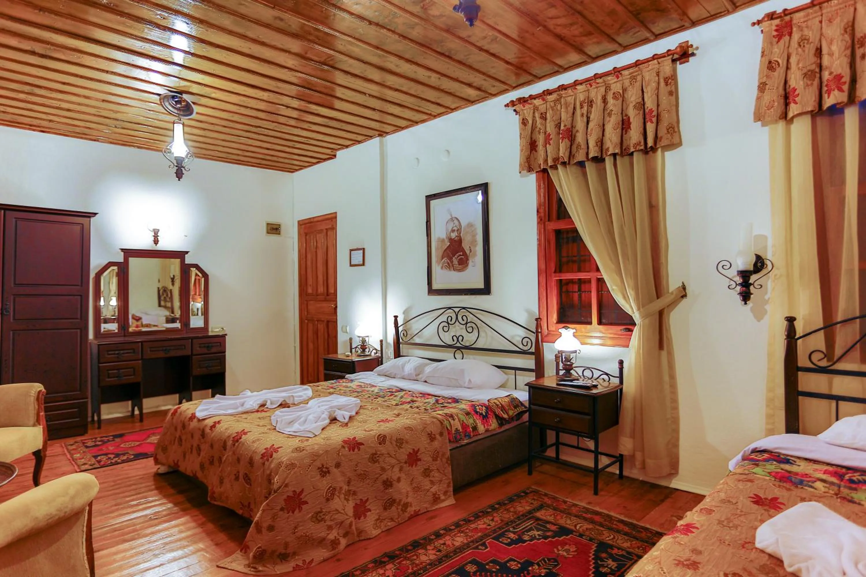 Bed in Atelya Art Hotel