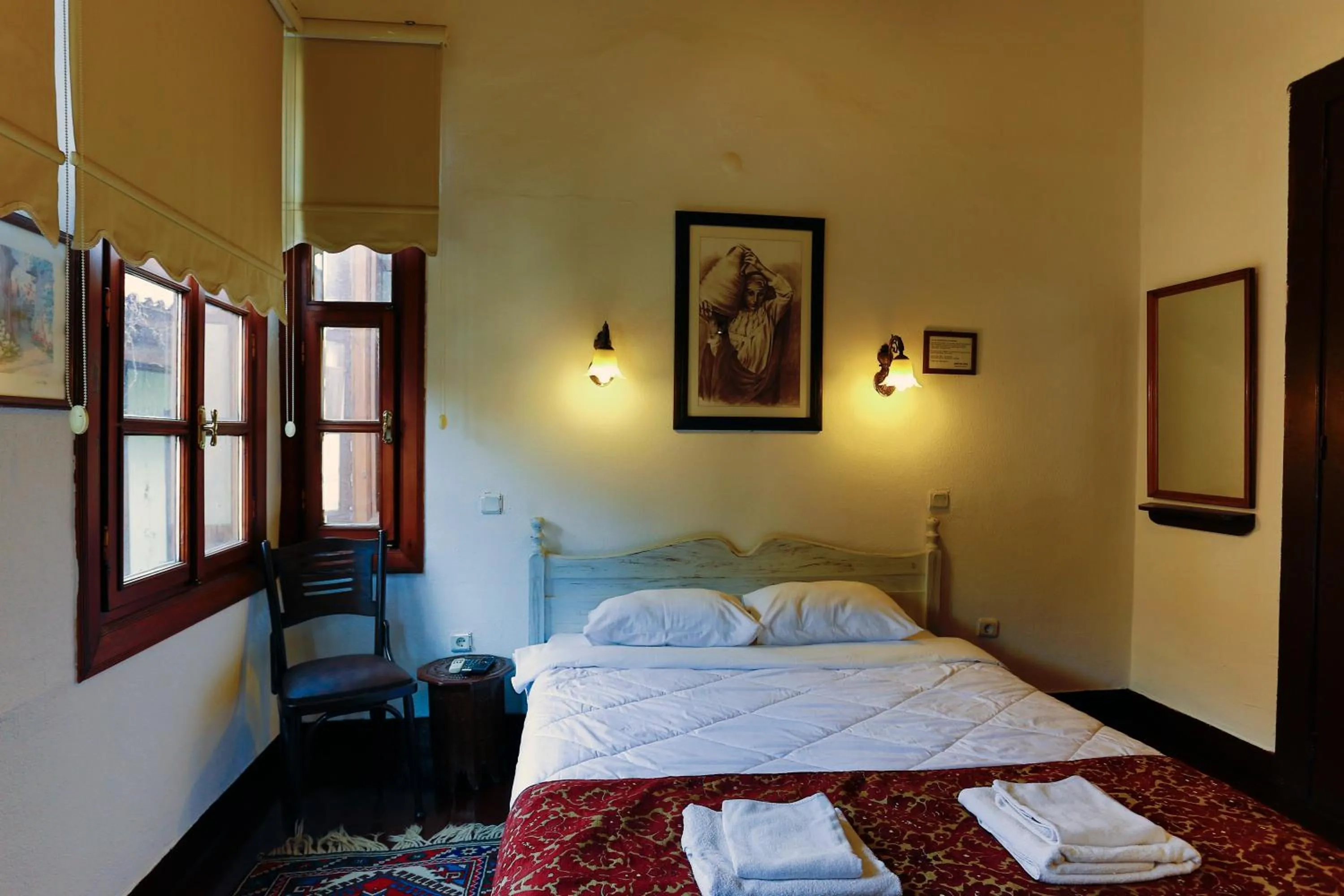 Bed in Atelya Art Hotel