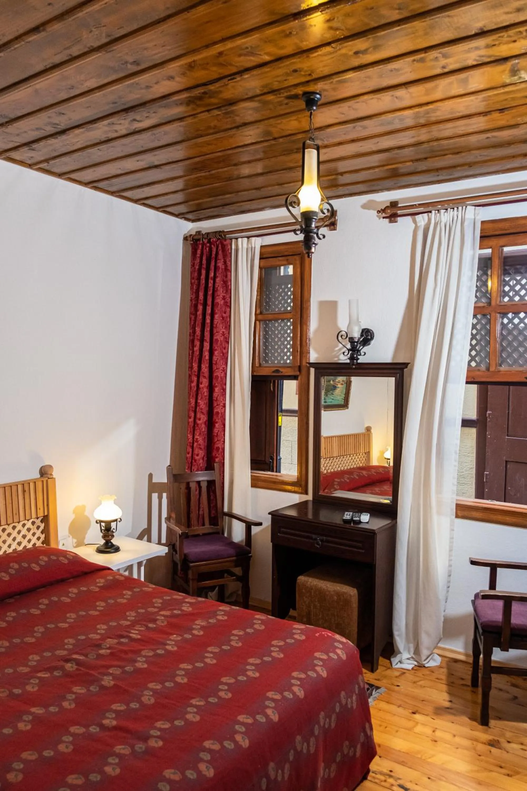 Bed in Atelya Art Hotel