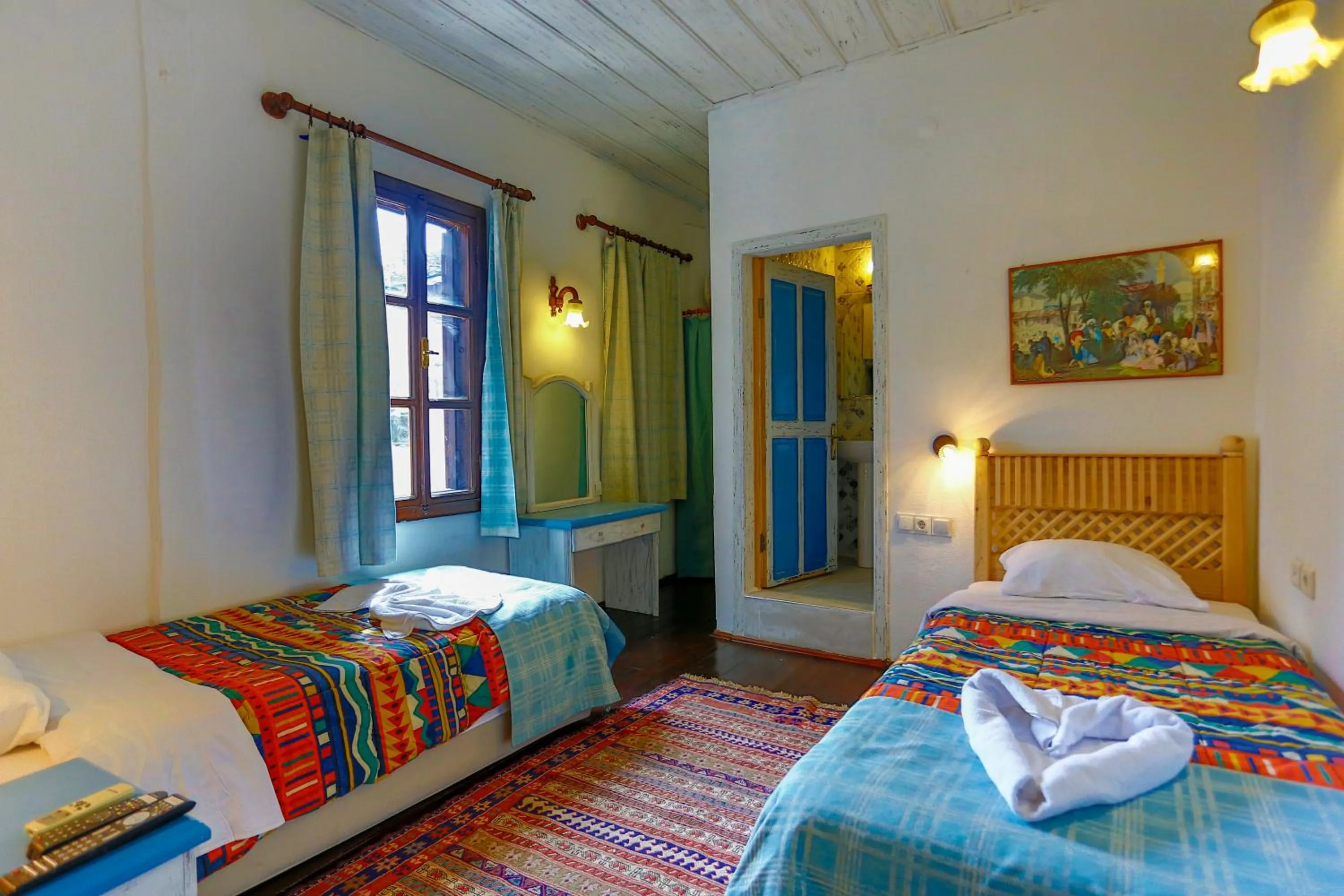 Bed in Atelya Art Hotel