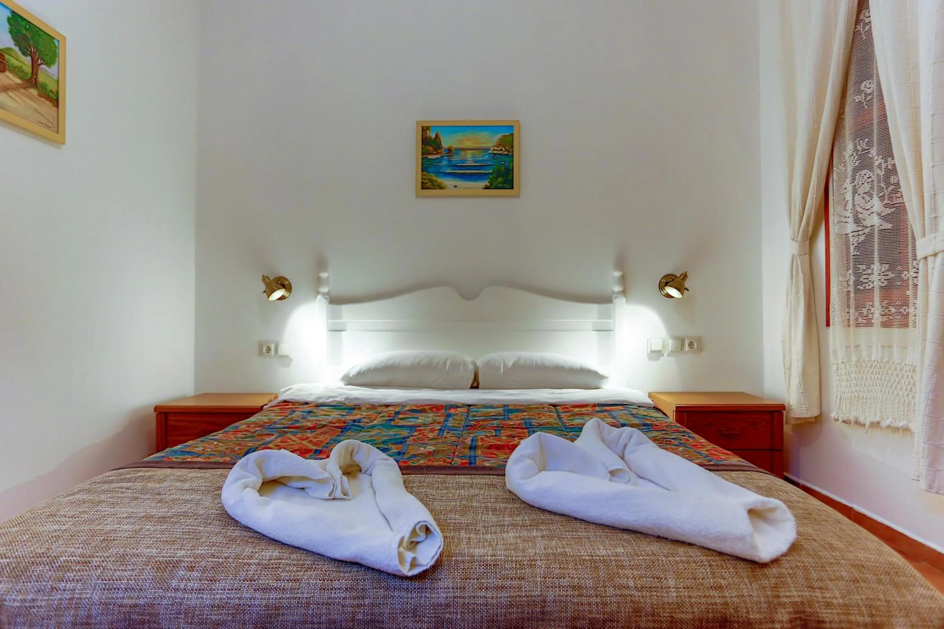Bed in Atelya Art Hotel