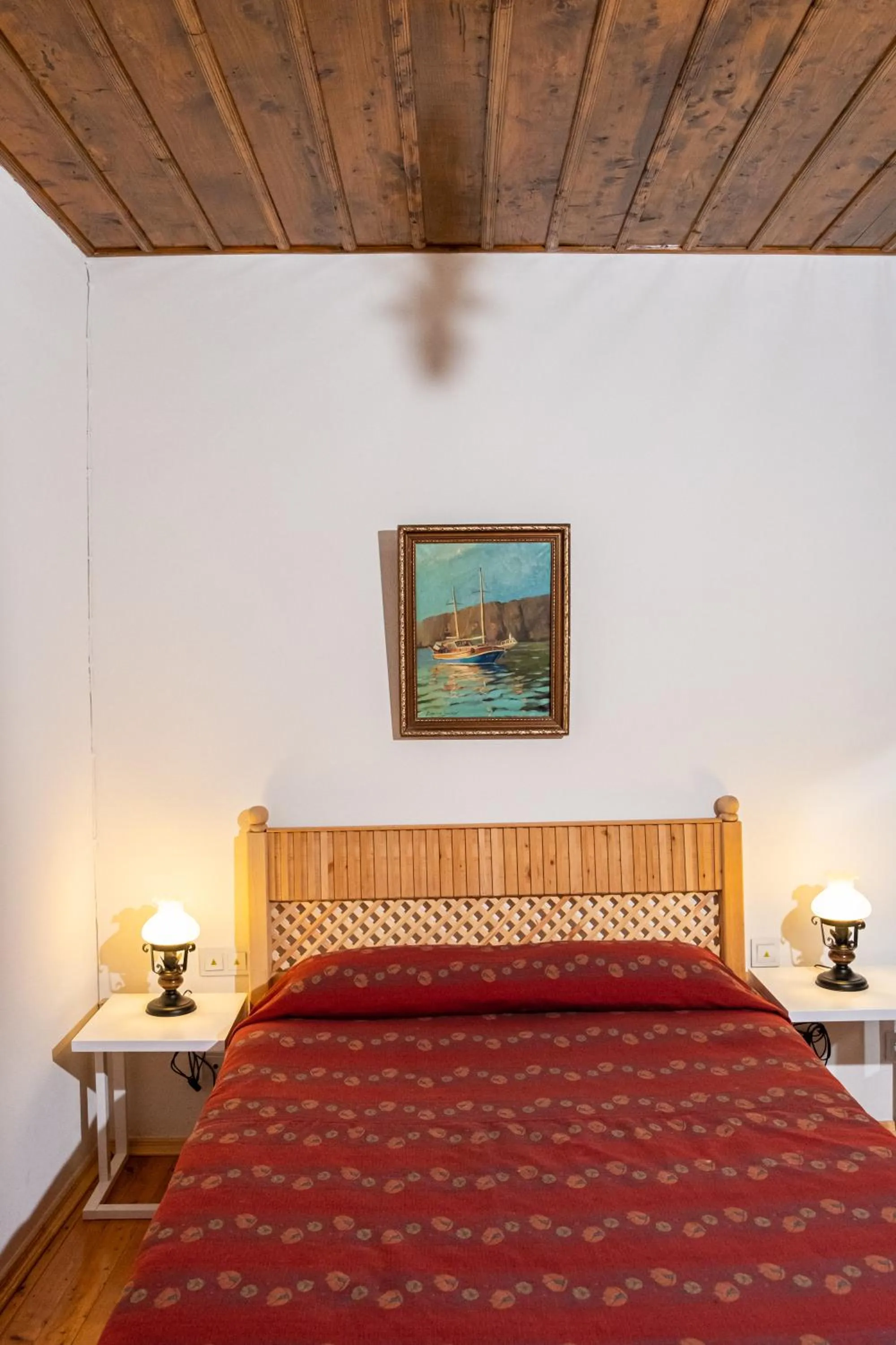 Bed in Atelya Art Hotel